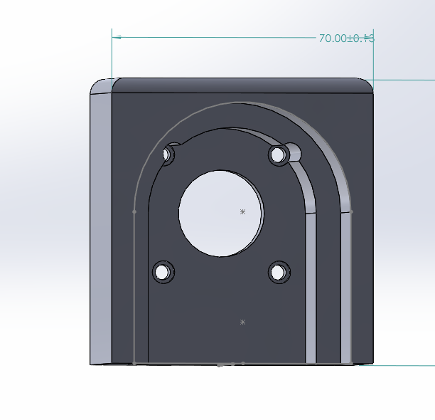 A technical CAD drawing of a metallic component with a central circular hole and four smaller holes, dimensions approximately 70mm in width.
