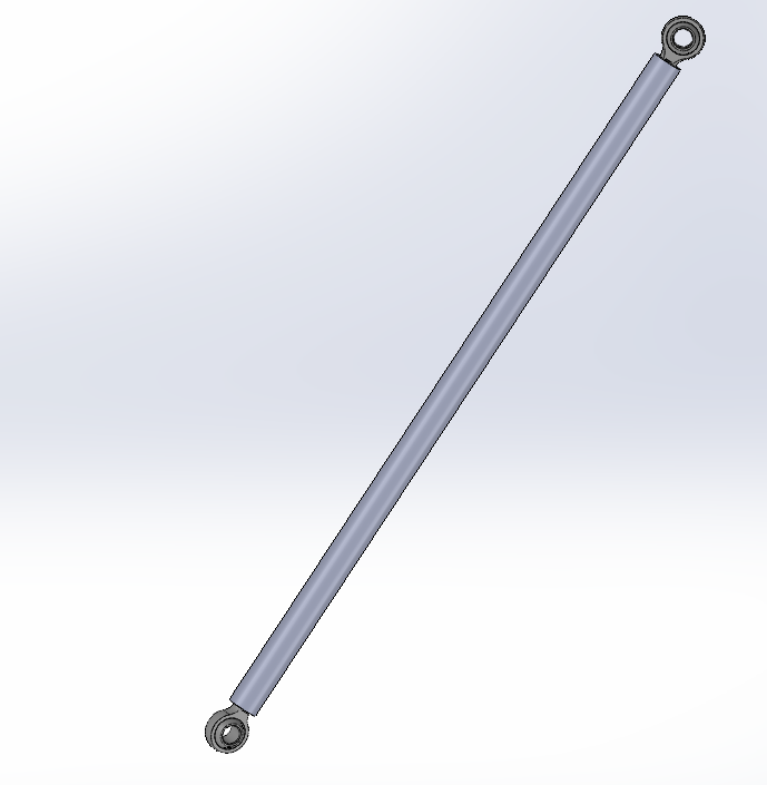 A metallic shock absorber with eyelets on both ends, used in vehicle suspension systems.