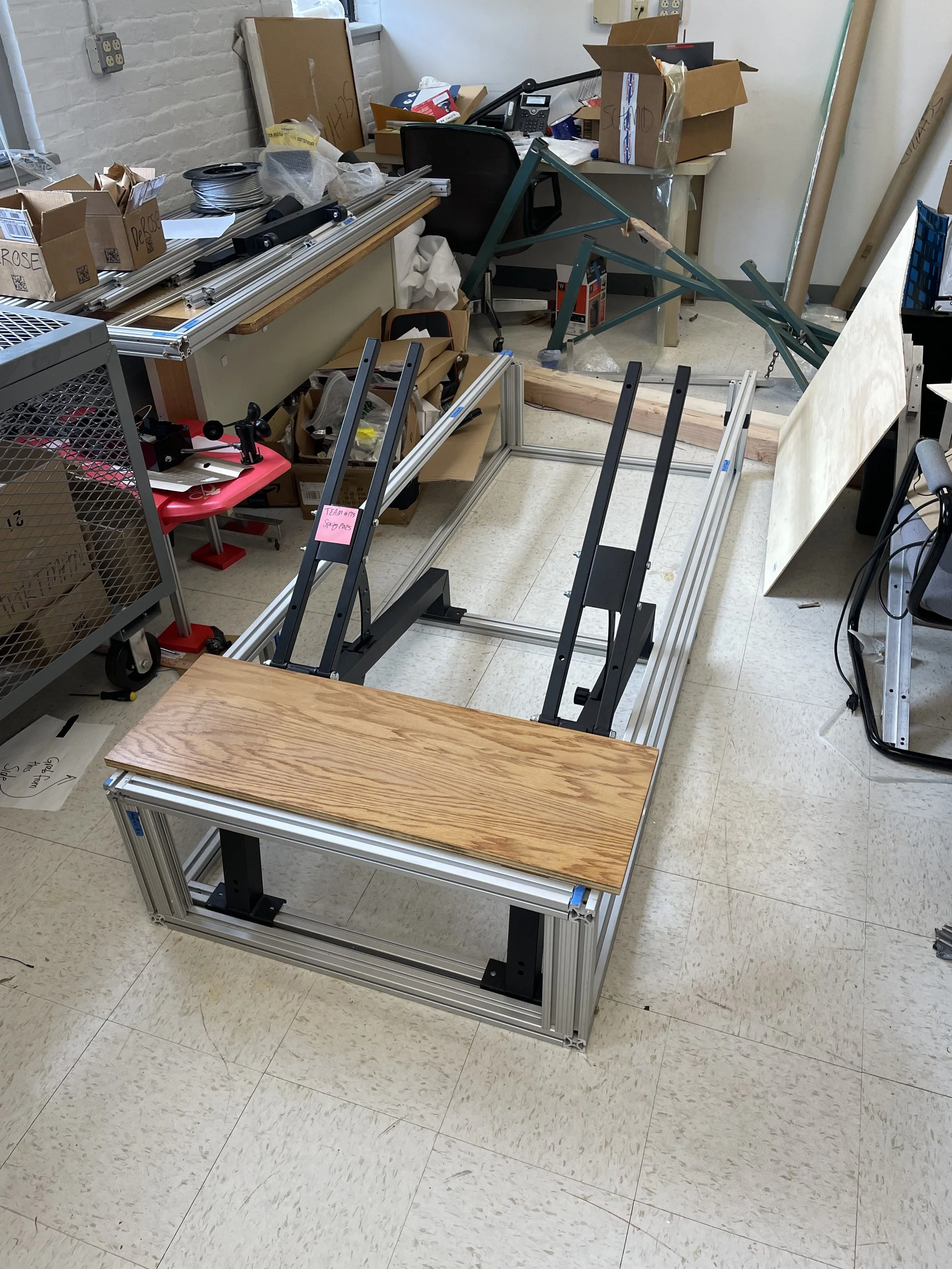 Assembling the base structure with gym benches and a step up platform