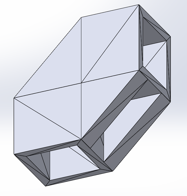 A 3D geometric wireframe model of a rectangular prism with additional internal structures and shading to show depth and edges.