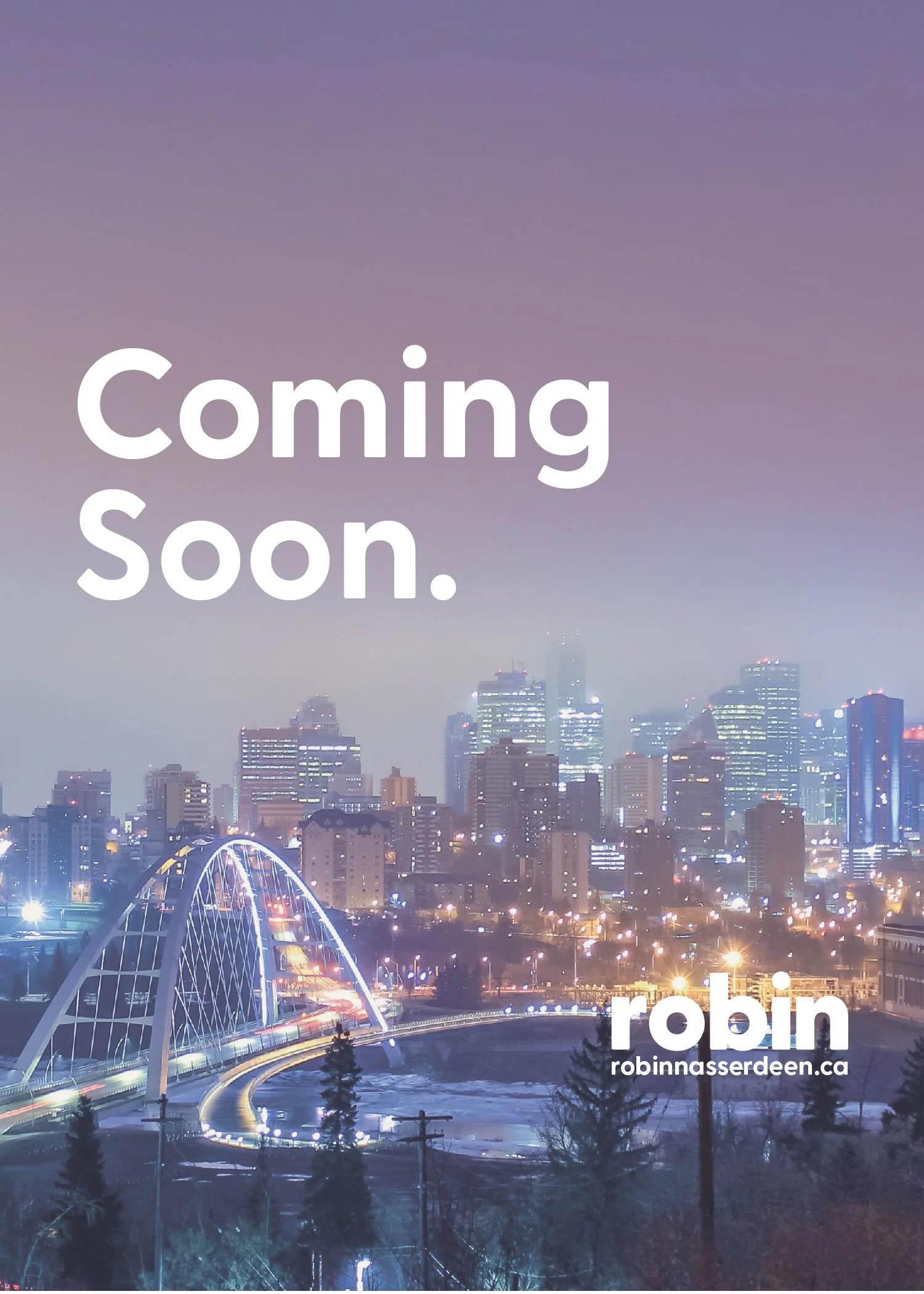 Nighttime cityscape with illuminated buildings and bridge, with the words 'Coming Soon.' and the name 'robin' along with the website robinasserdeen.ca.