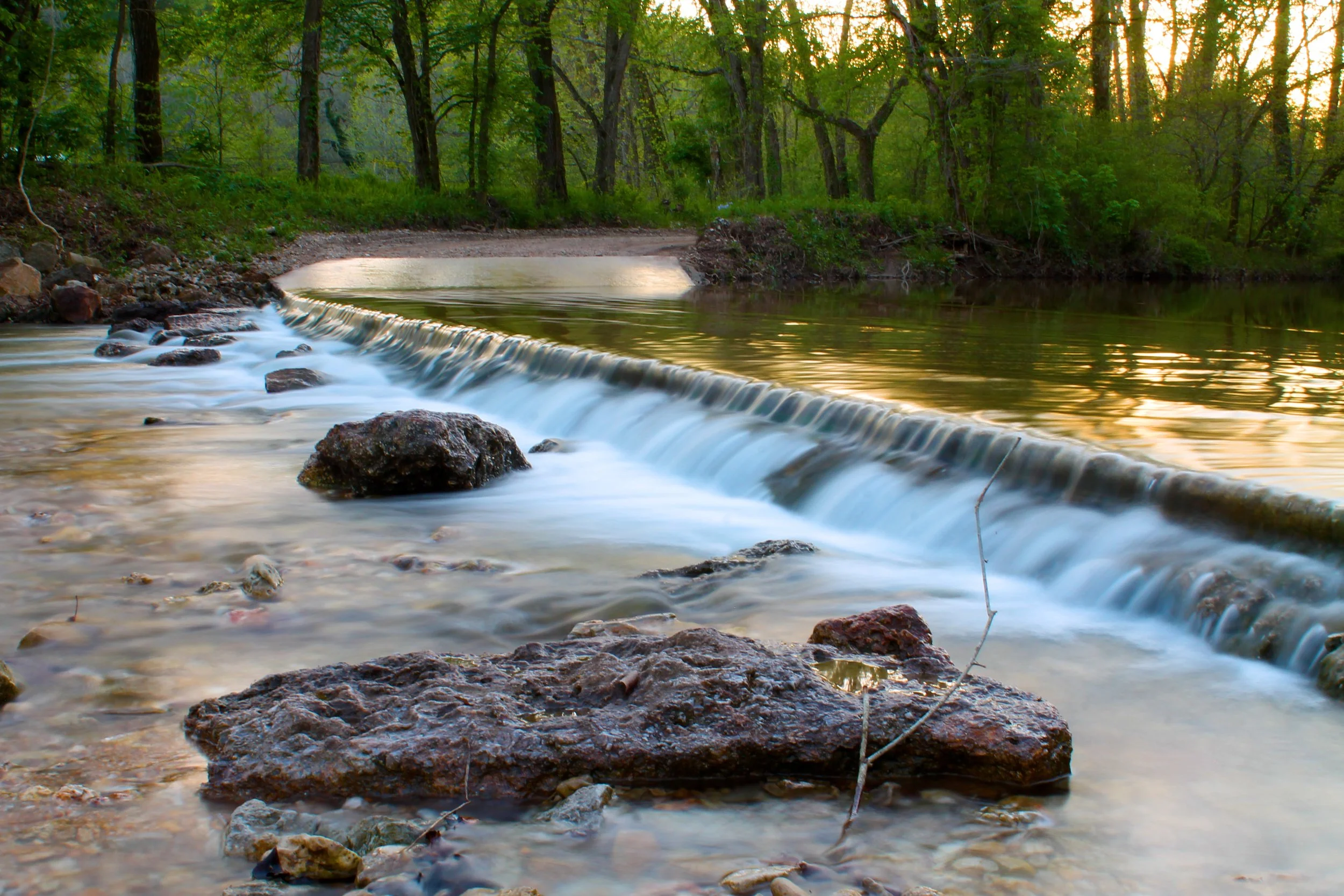 Along the backroads of Camdenton, Missouri you'll find some low bottom roads where there will often be a creek running through.