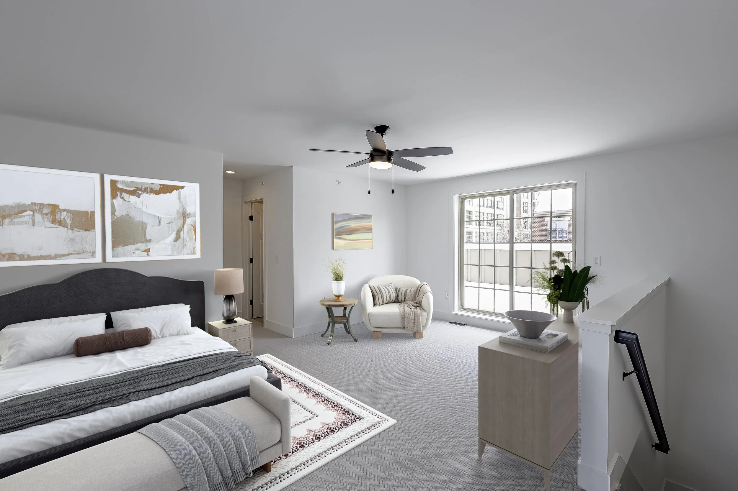 Modern bedroom with a bed, nightstand, armchair, artwork, and large window with city view, decorated in neutral tones.