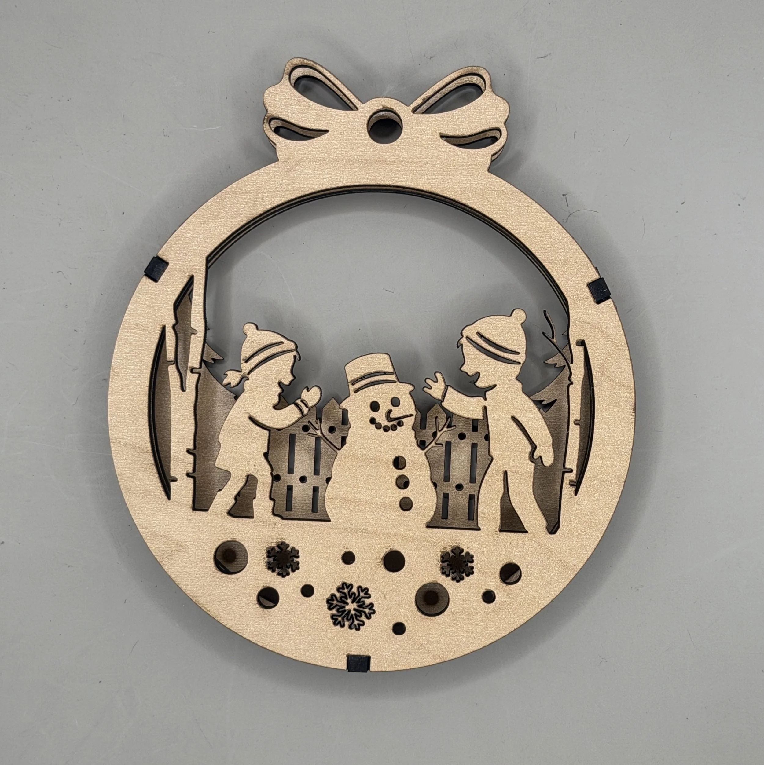 Building a snowman ornament from the Snow Day 3-pack, maple