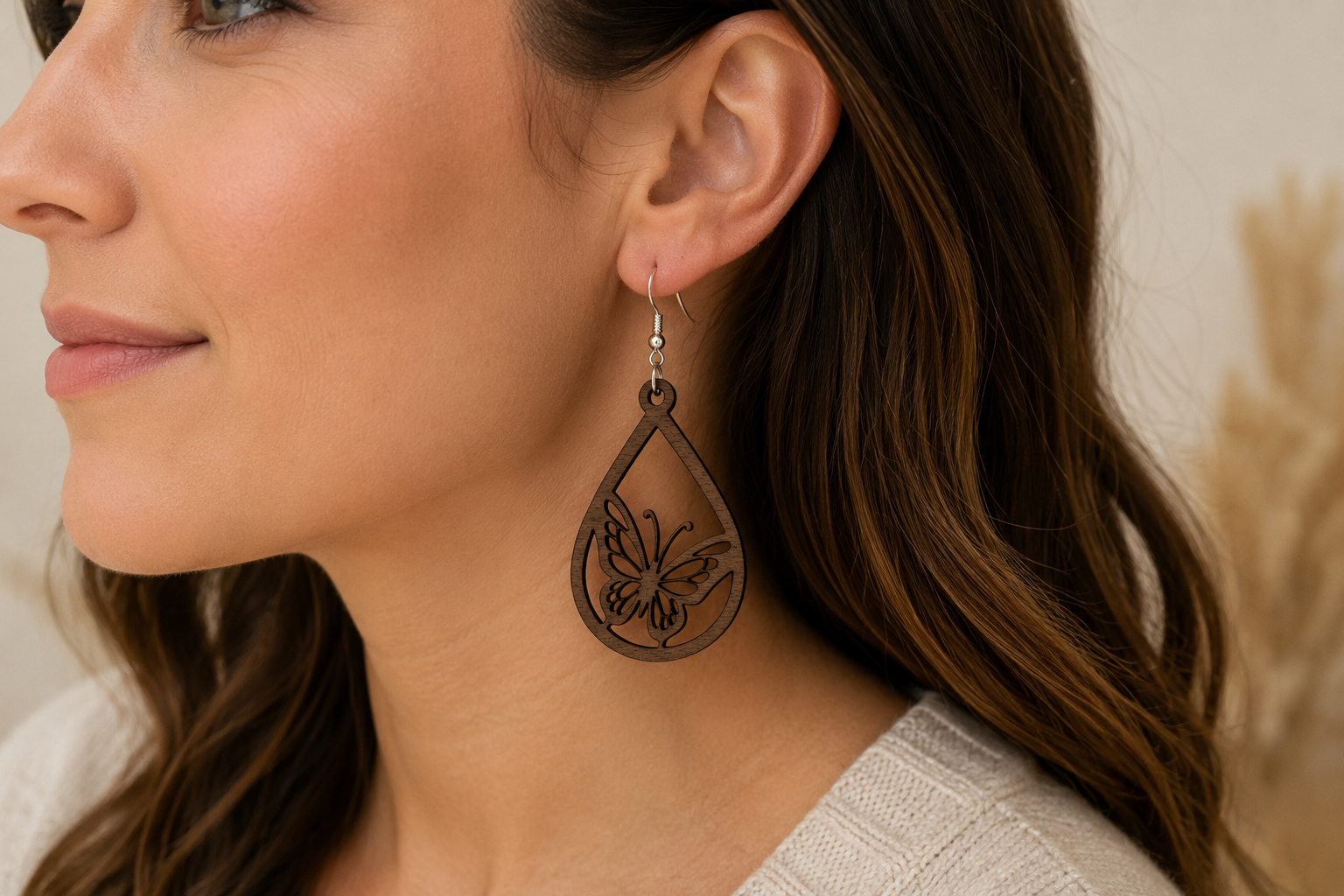 Walnut Butterfly Frame Teardrop Earrings On Model.png