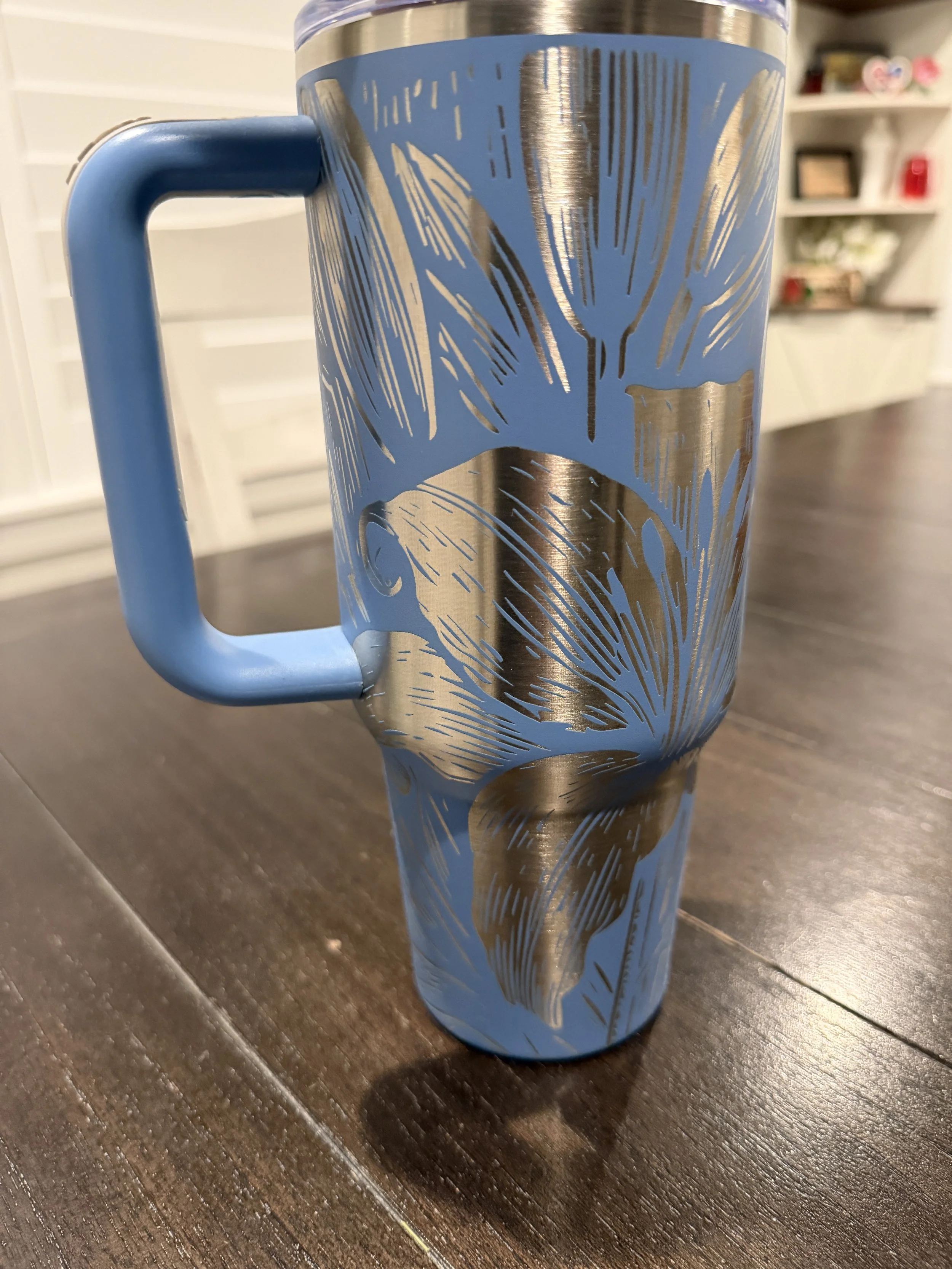 Light Blue Tumbler with Lilly Full Wrap pattern and handle.JPG