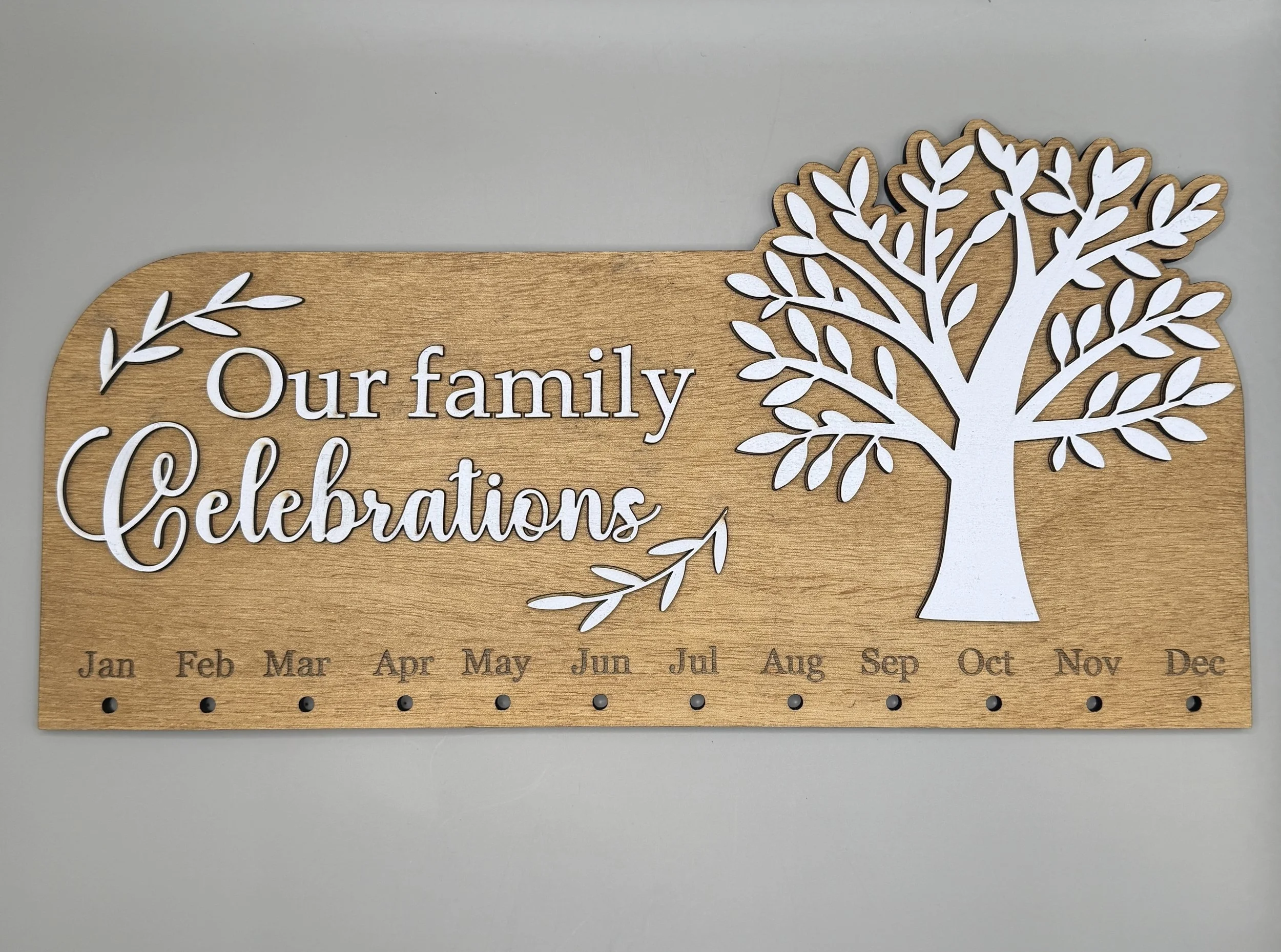 Our Family Celebrations Sign Raised w White Lettering.JPG