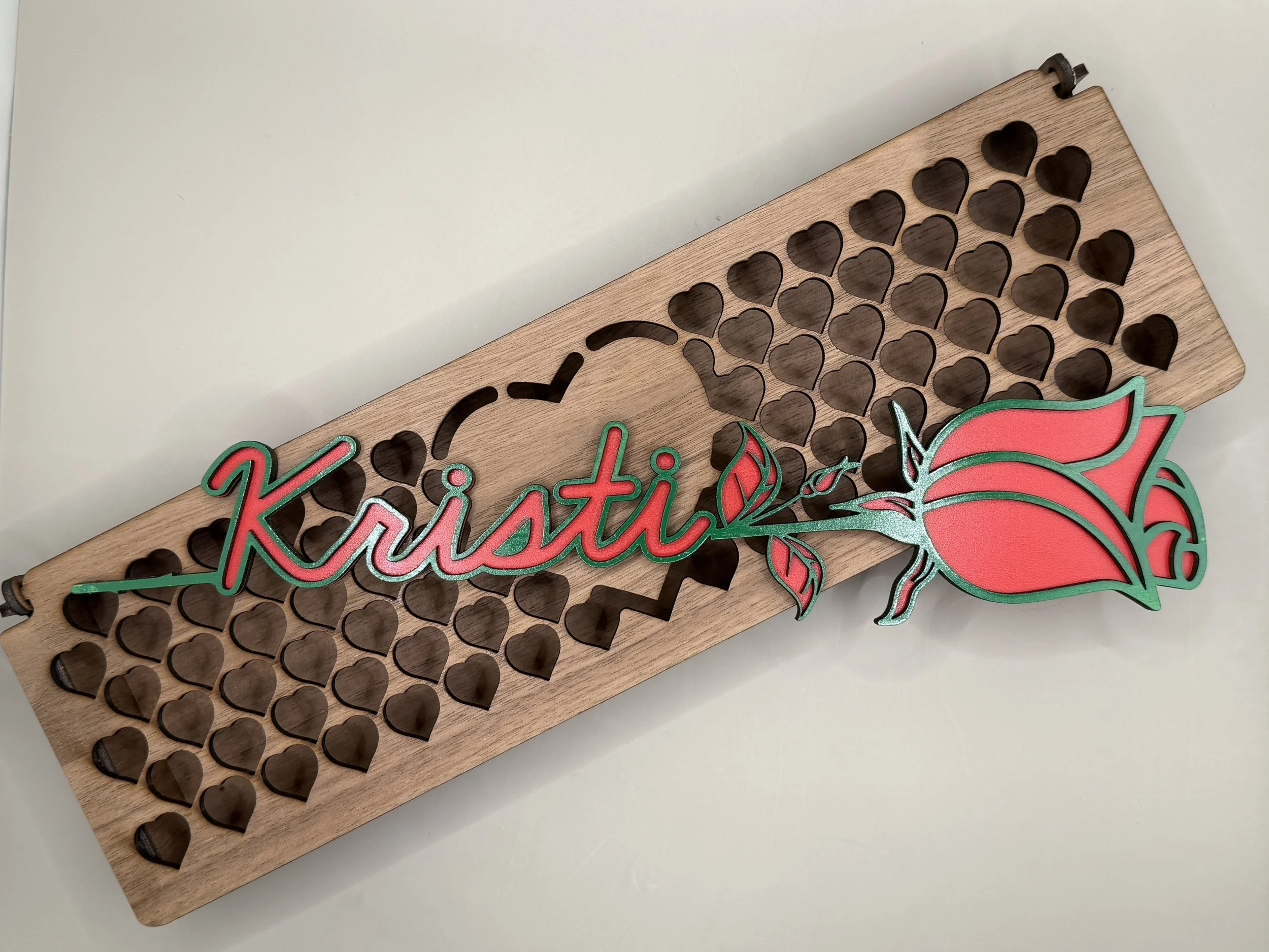 Name Rose on top of Walnut Box - angle.JPG