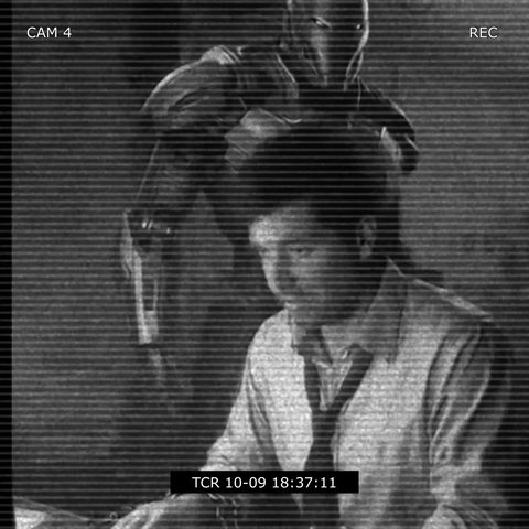 A human employee being observed by a robot