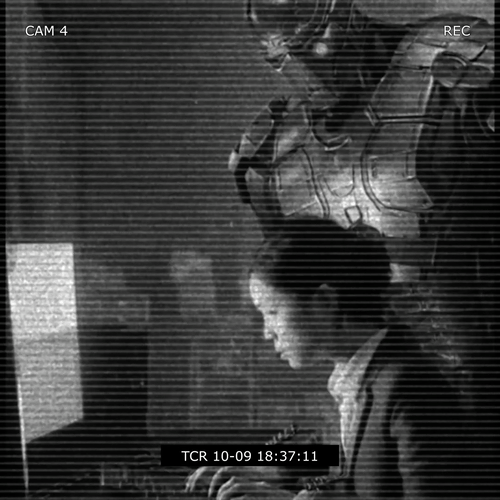 A human employee being observed by a robot