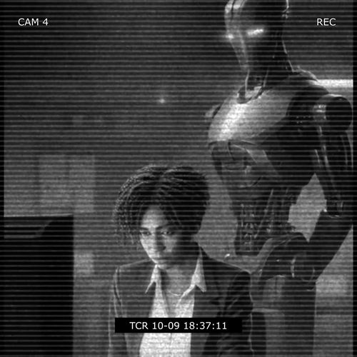 A human employee being observed by a robot