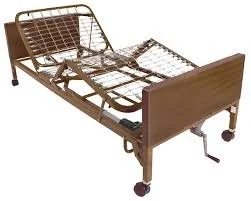 Hospital bed frame with no mattress, metal side rails, and wooden headboard and footboard.