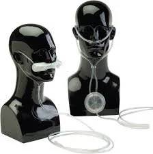 Two black mannequin busts displaying virtual reality headsets with attached sensors