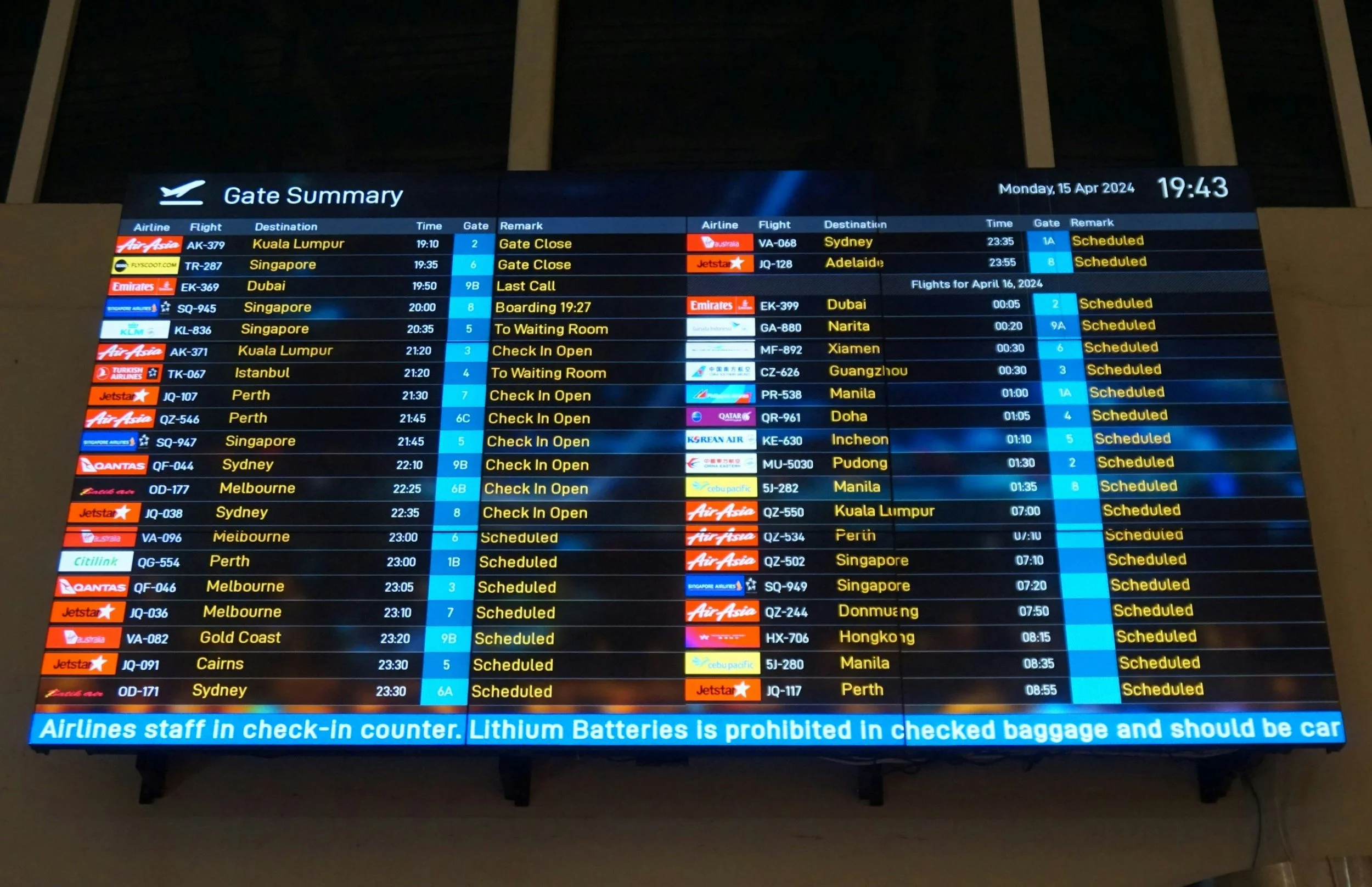 Flight departure information displayed on an electronic board at an airport, listing flights, destinations, departure times, gates, remarks, and airline details.