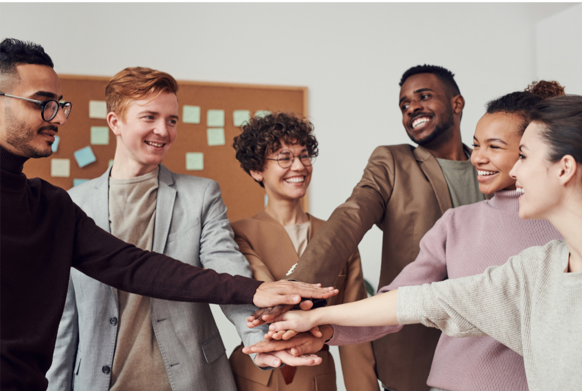 Leadership coaching session helping a team strengthen communication, confidence, and emotional resilience