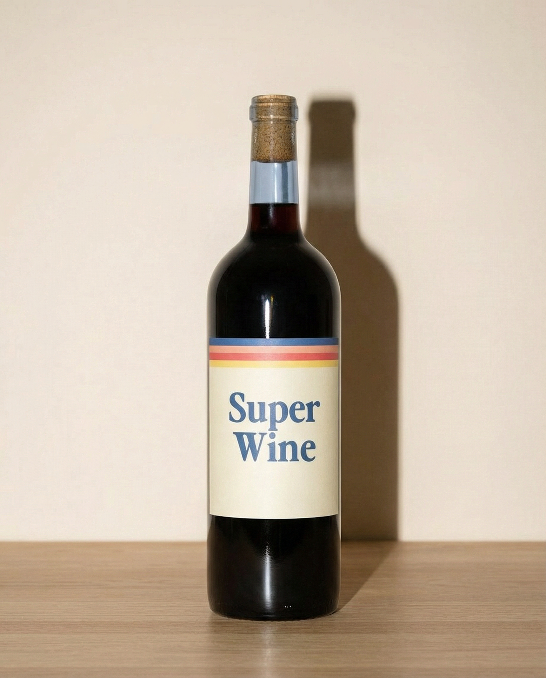 flash_ wine bottle sitting on light oak wood table.png
