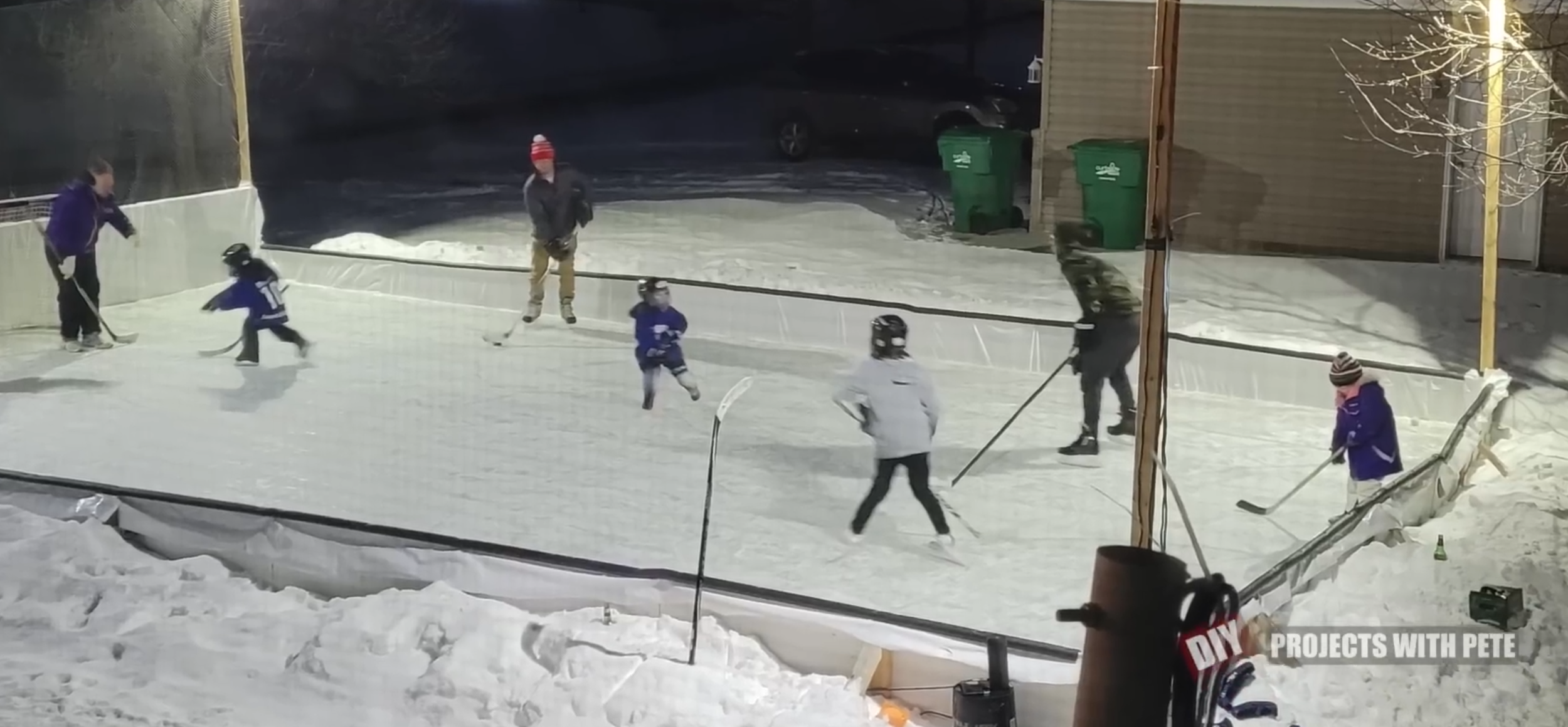 kids playing on ice rink