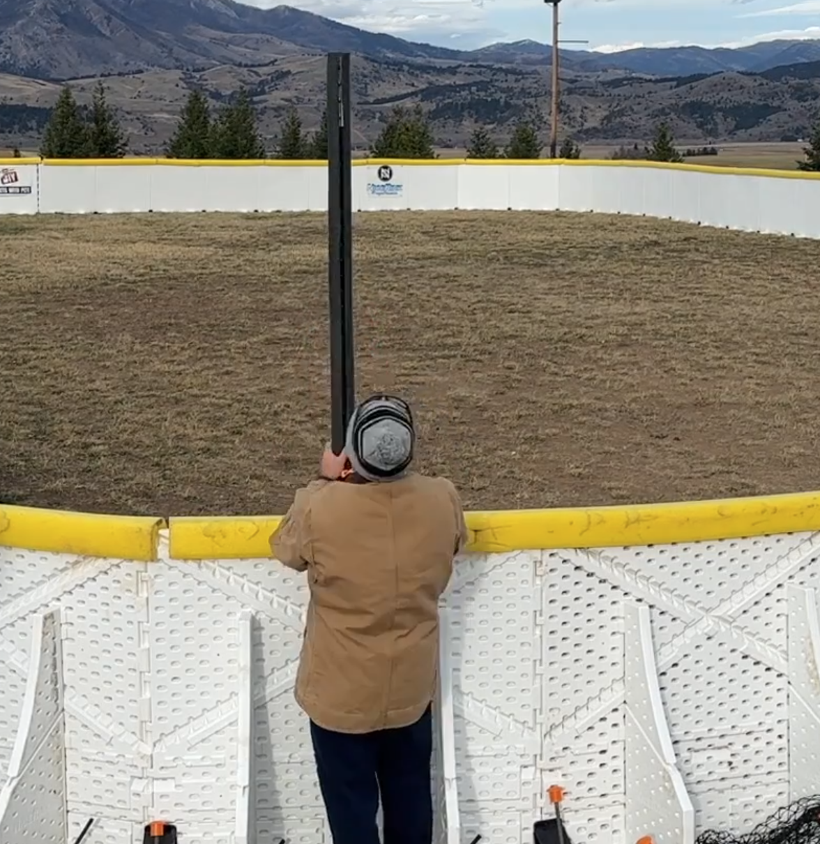 Installing pipe insulation over each T-post