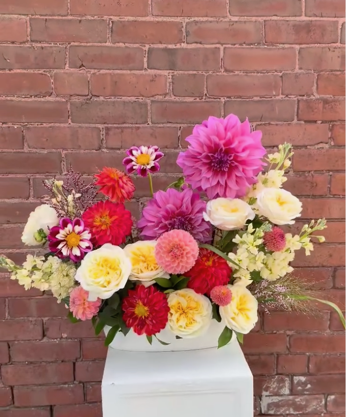 Bright and Bold Floral Display by Firehouse Flowers