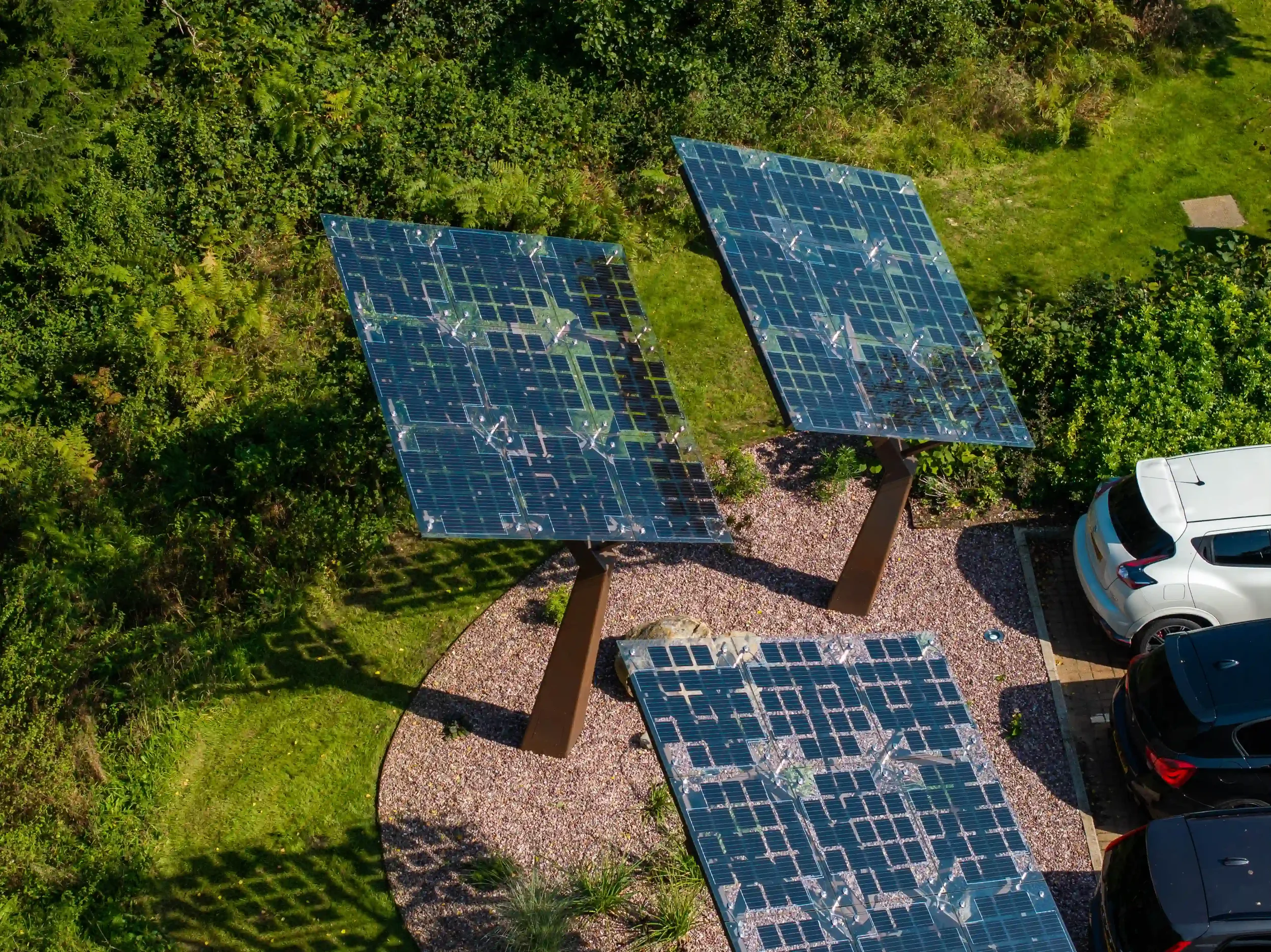 The first project, Urban Solar Trees, being completed near a parking space.