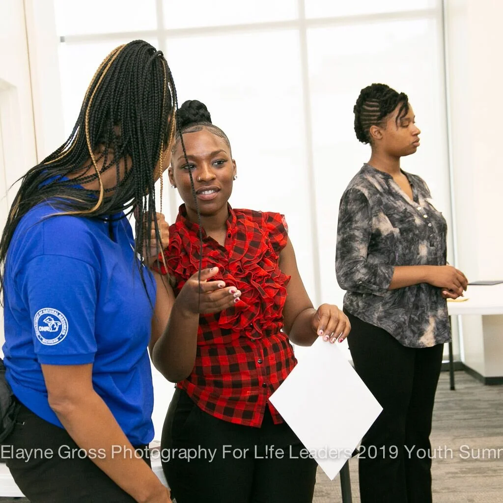 Charvae and Wisdom leading a breakout session.jpeg