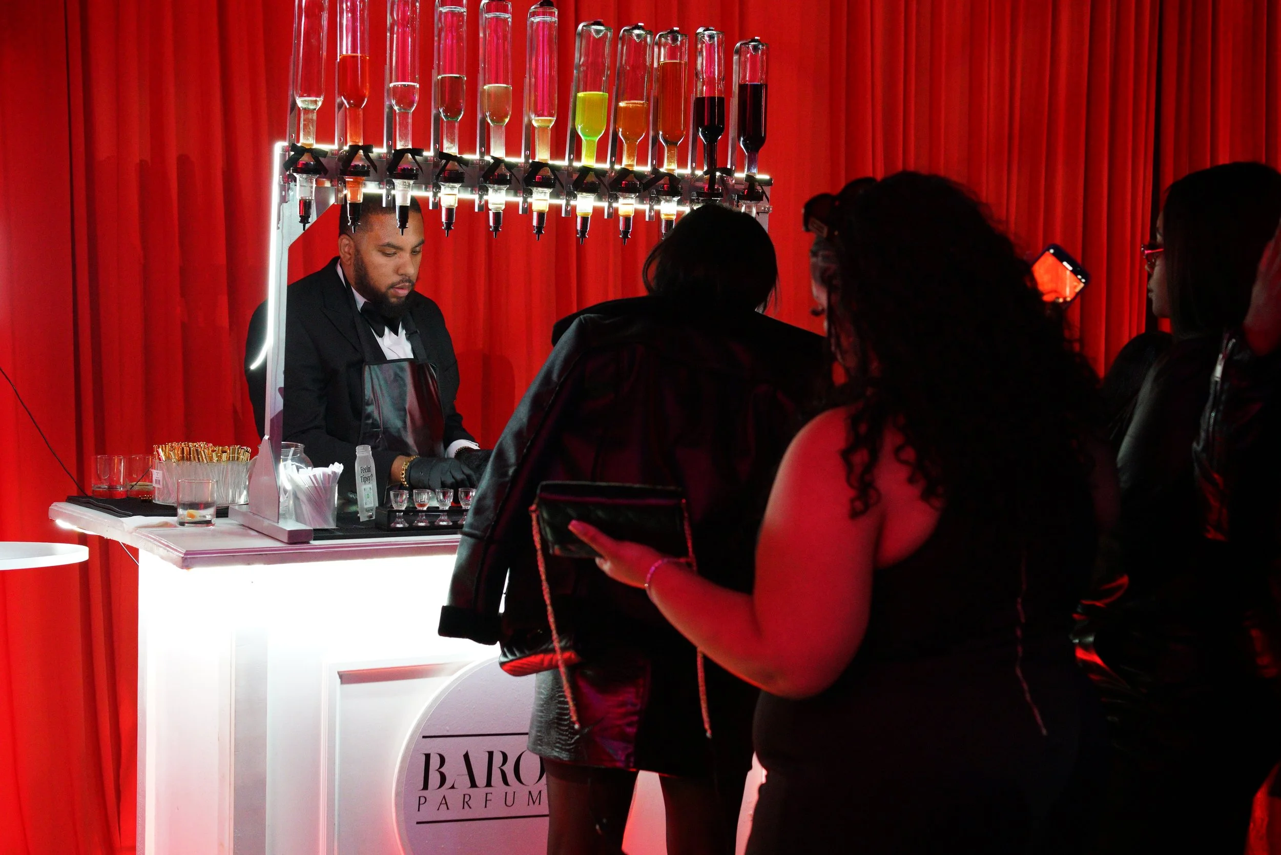 Baroma Parfum Bar founder professionally curating and creating a custom fragrance on site during a luxury mobile perfume bar experience for a wedding or private event in Atlanta.