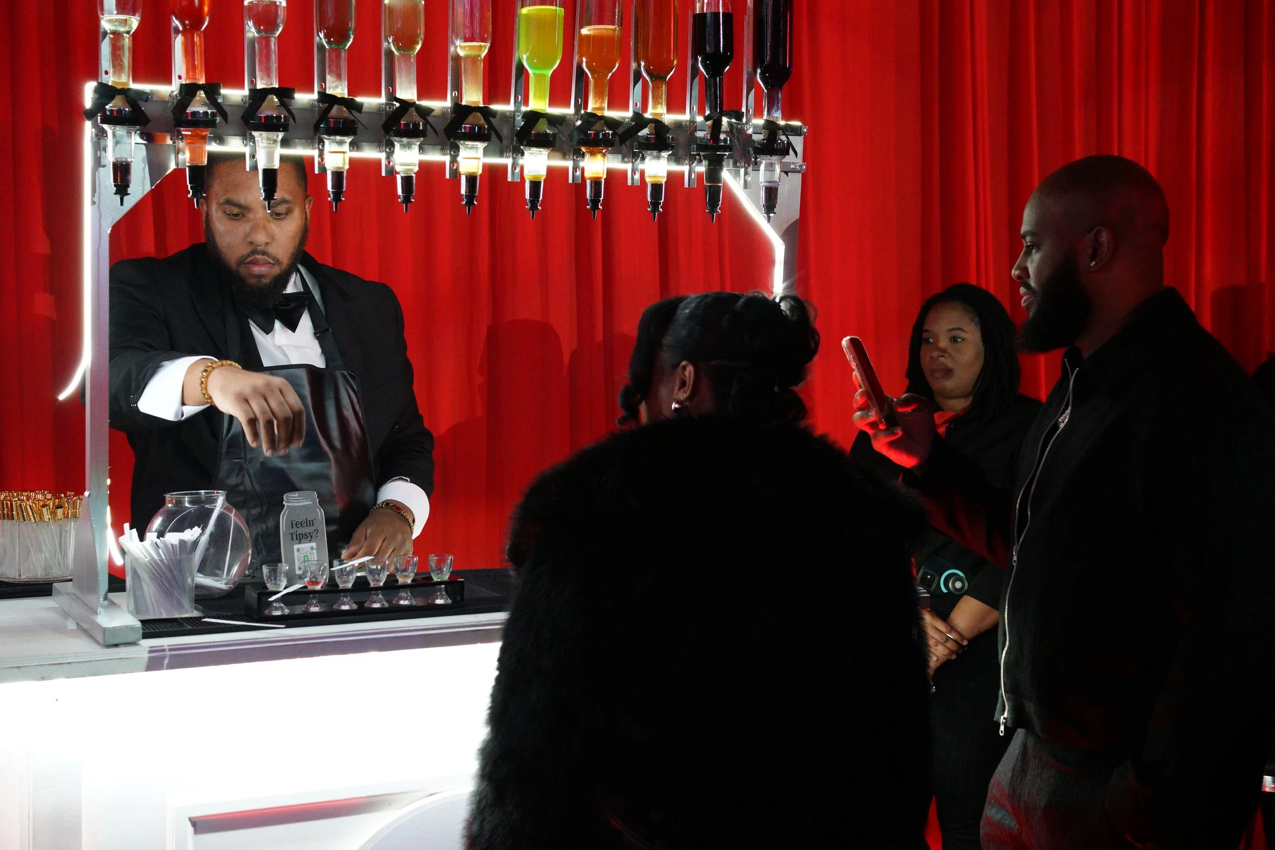 Baroma Parfum Bar founder professionally creating custom fragrances on site during an upscale activation, delivering a luxury mobile perfume bar experience for a high-end event in Atlanta.