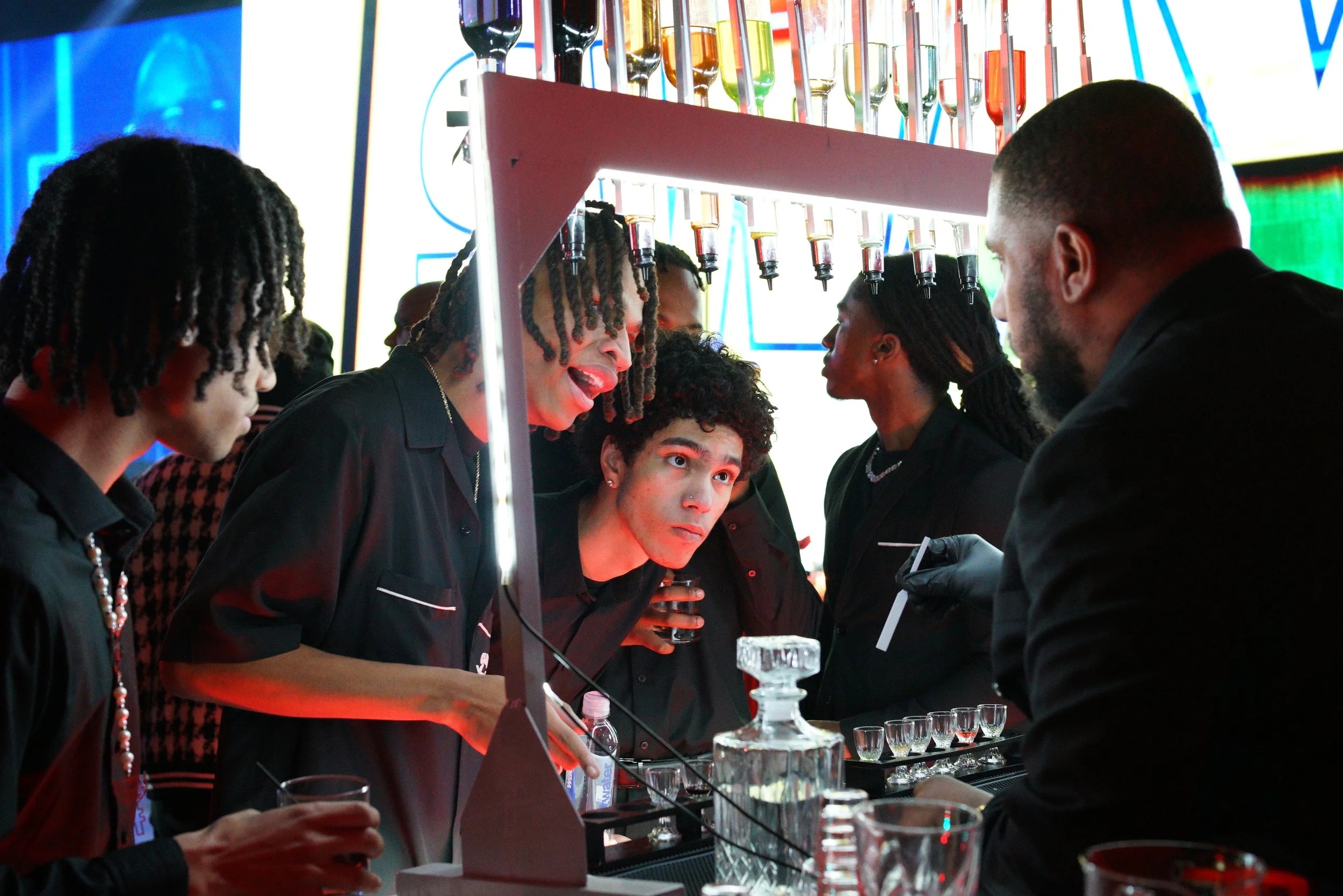 Baroma Parfum Bar founder explaining the mobile perfume bar experience to guests, highlighting travel availability and on-site custom perfume services for events in Atlanta and beyond.