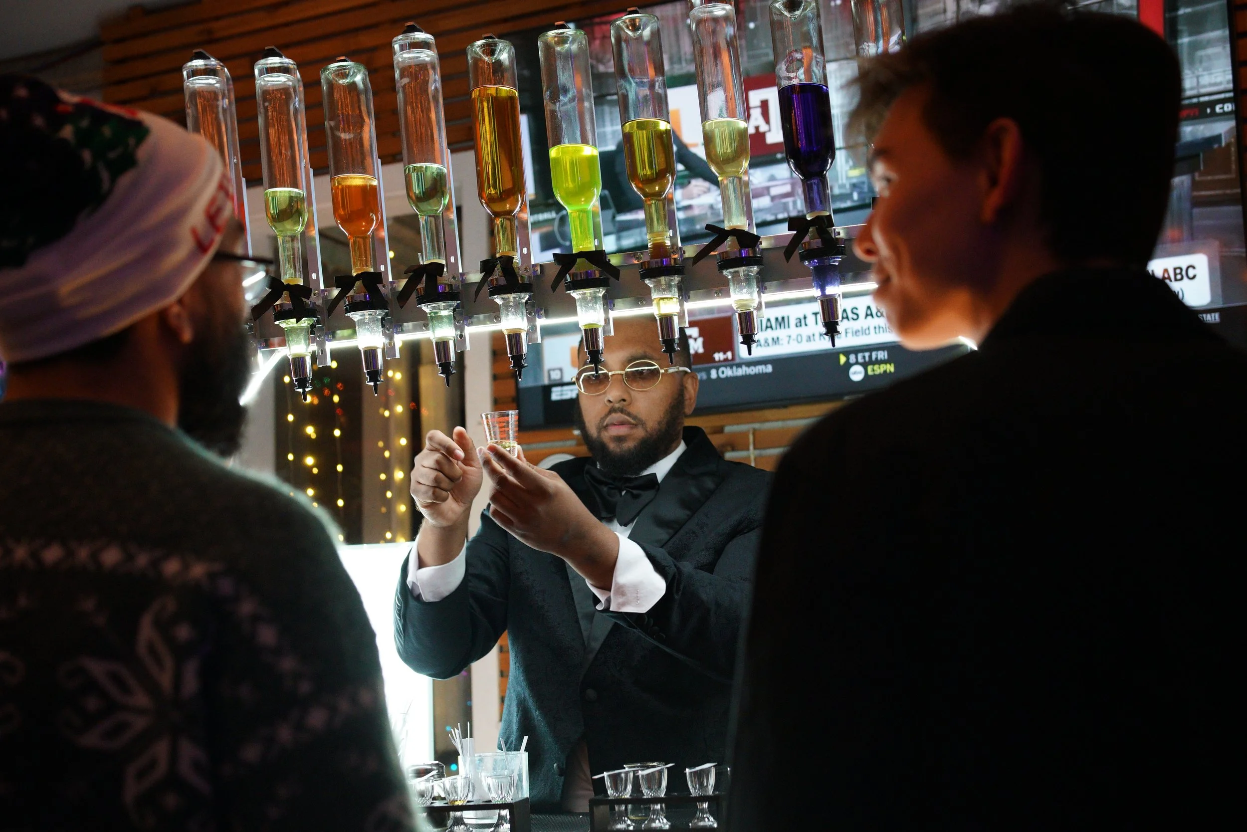 Luxury mobile parfum bar setup in Atlanta featuring personal crafted fragrance oils, custom bottles, and a guided fragrance experience at a private event.