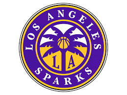 Los Angeles Sparks logo with purple, gold, and white colors, featuring a basketball and a palm tree inside a circular emblem.