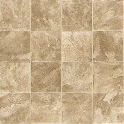 A close-up view of a beige tiled wall with visible grout lines.