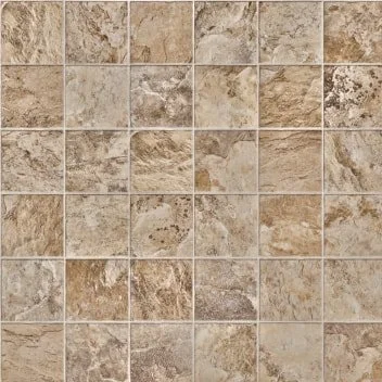 Close-up of a tiled surface with beige and brown stone tiles.