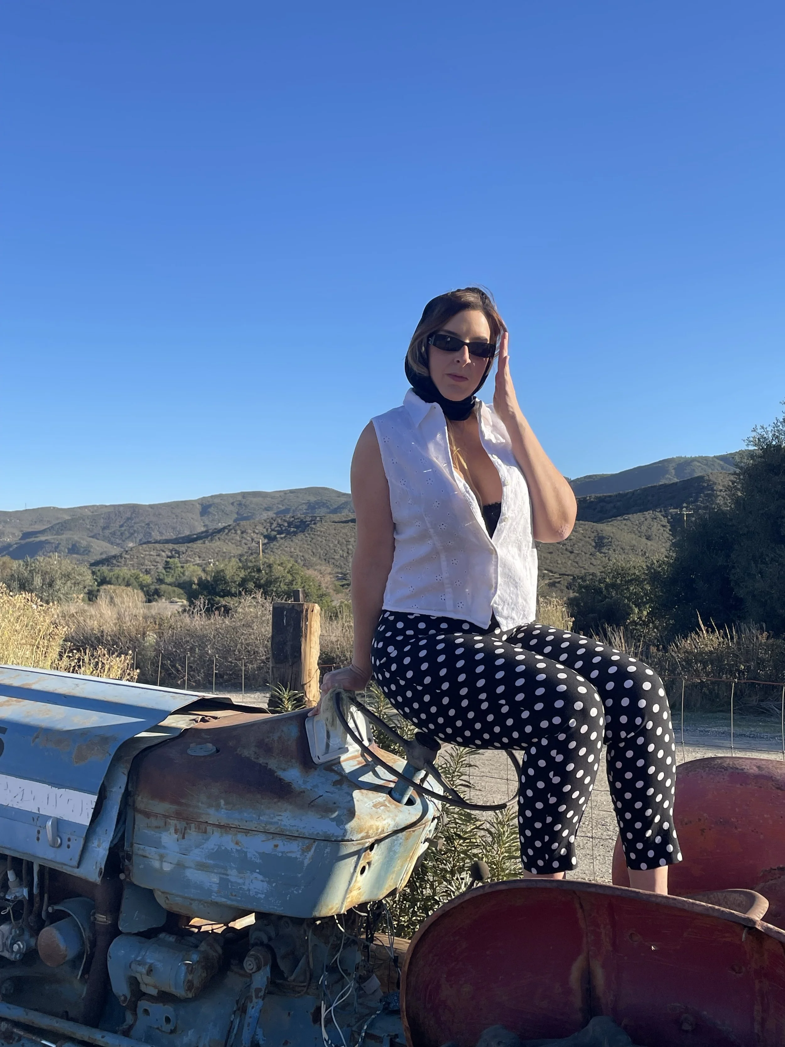 White Sleeveless Button-Up