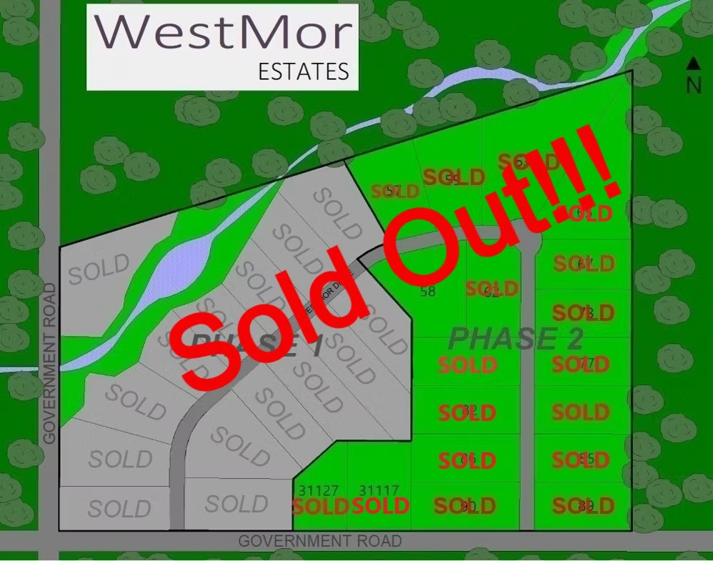 Map of WestMor Estates with lots marked as sold, some in Phase 2, surrounding green areas and a creek, with roads labeled Government Road and Government Road.