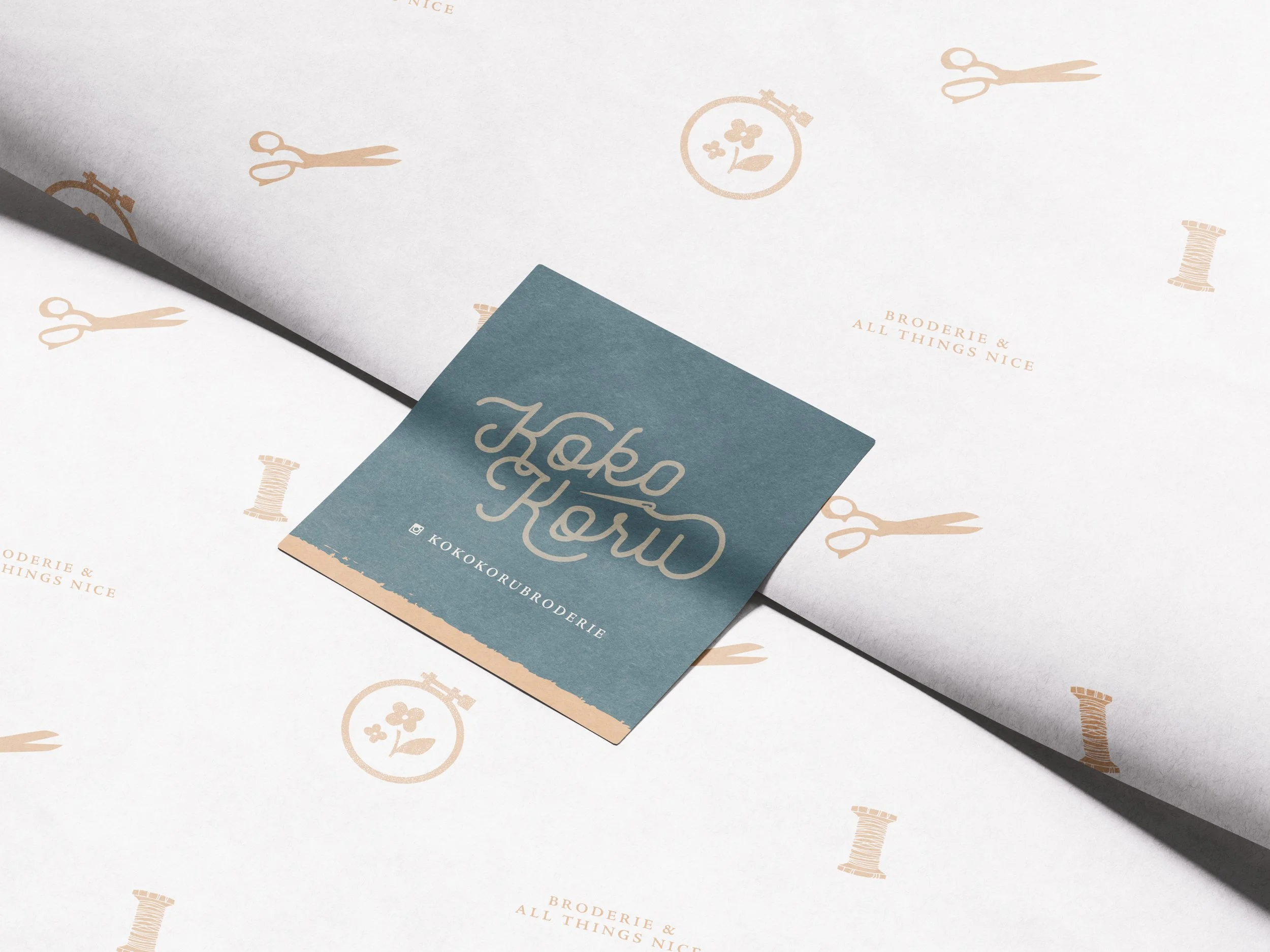 Soft neutral colour palette, elegant typography, and organic branding elements created for Kokokoru Broderie