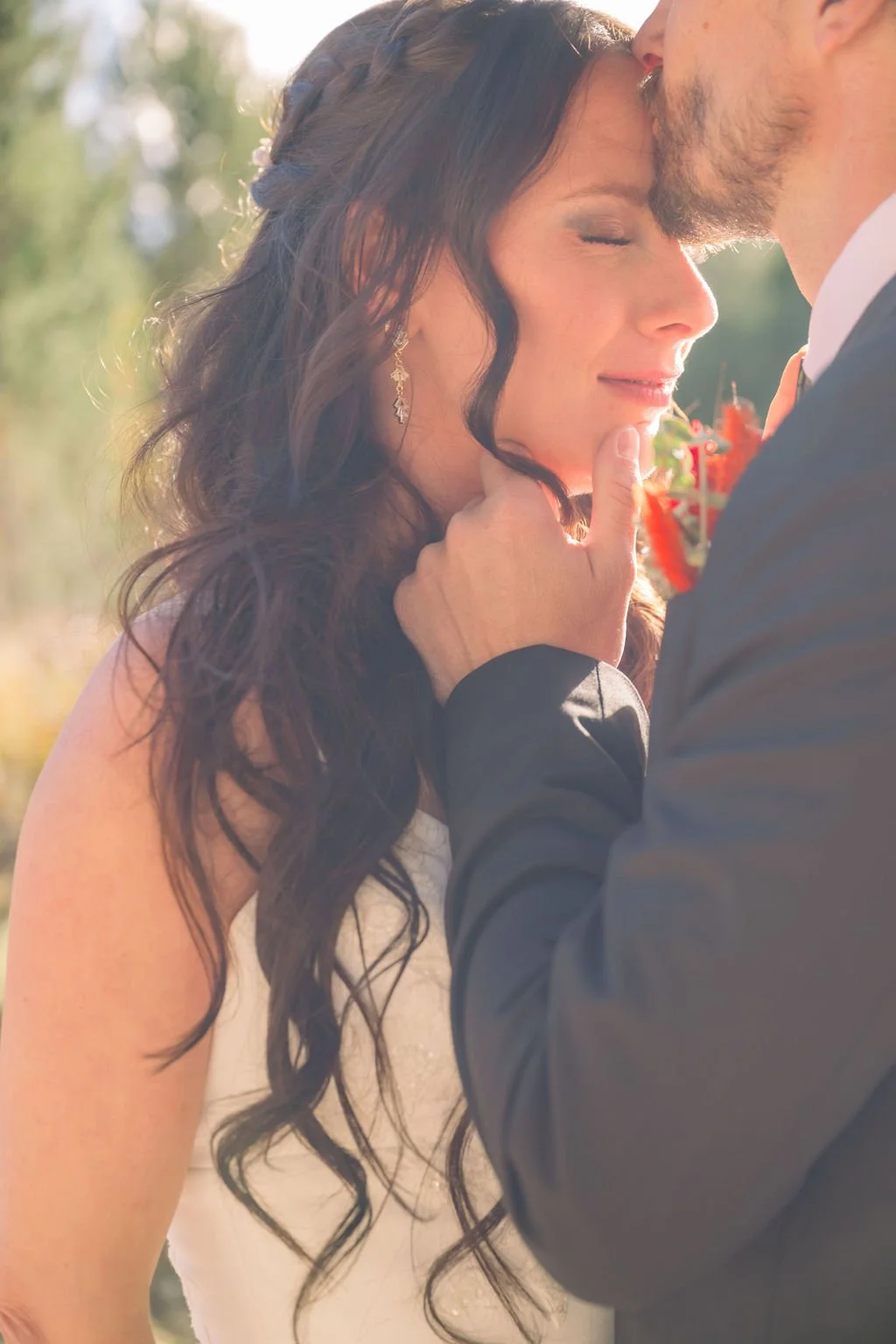 grand-teton-wedding-portrait-groom-kissing-bride-close-up-jackson-hole.jpg