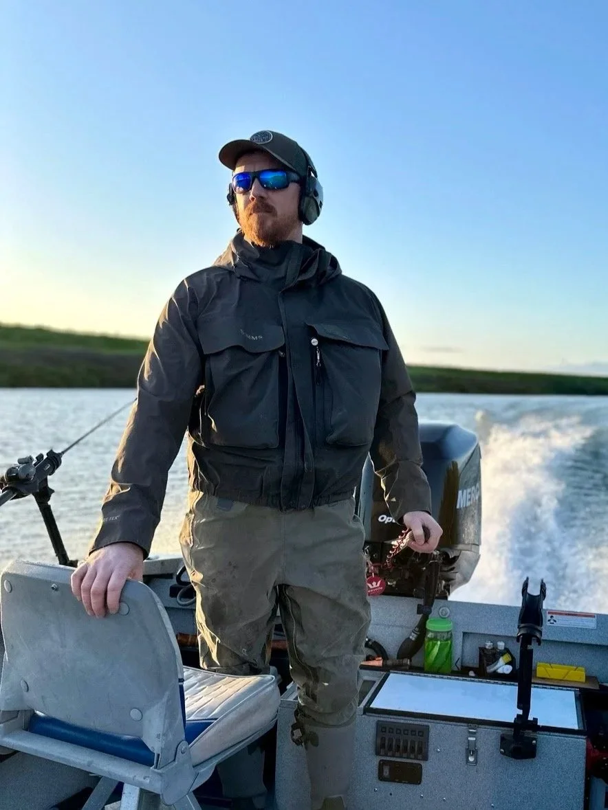 Capt. Nate Koenigsknecht running his boat on the Willamette River.