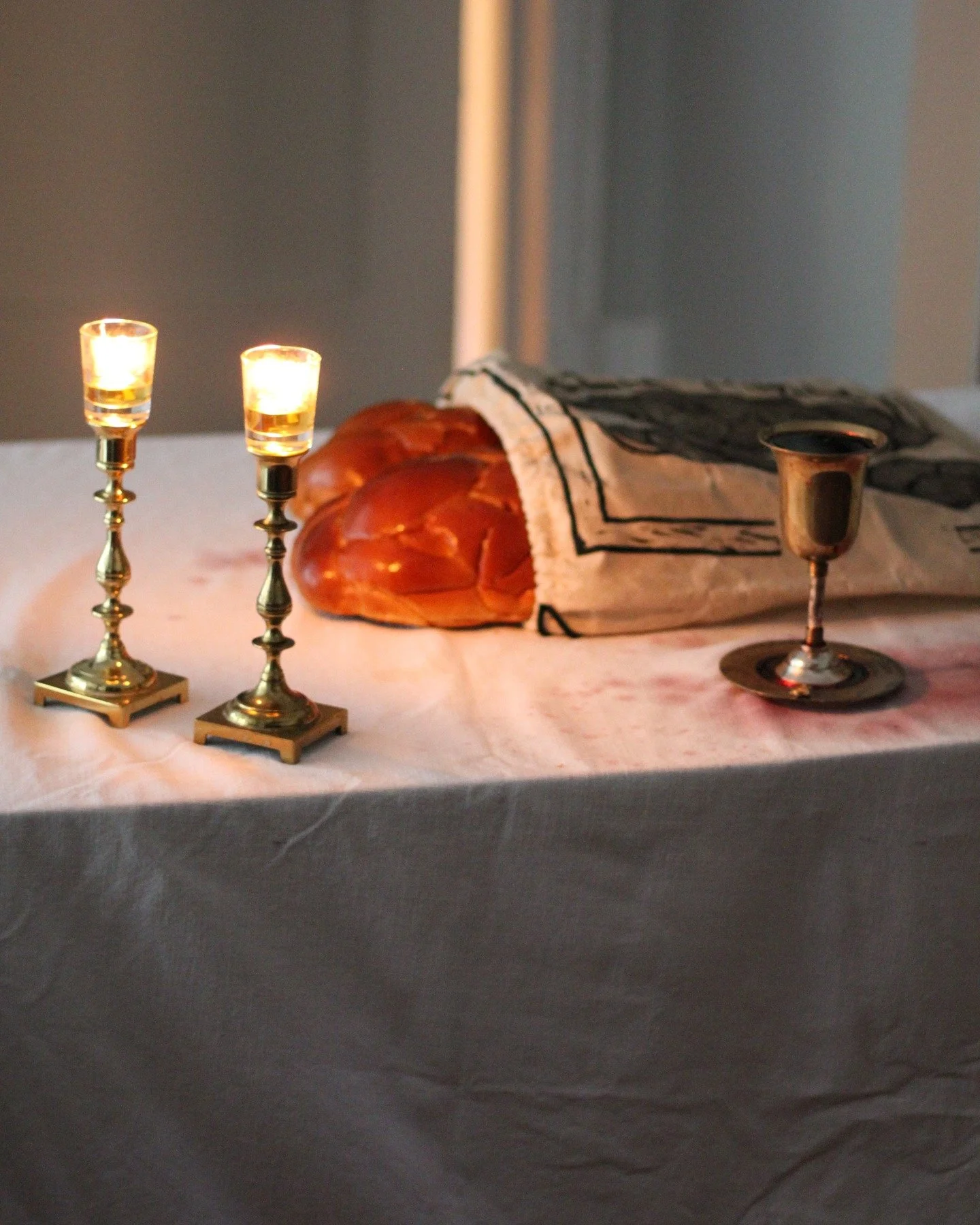 Wine stains and peonies on my Shabbos table.
Beeswax-coated challah bags are up on Etsy!
- - - 
A love letter to bakers and eshet chayils&mdash;especially my mom, who taught me how to braid (one of these is hers for Mother&rsquo;s Day).

Challah shou