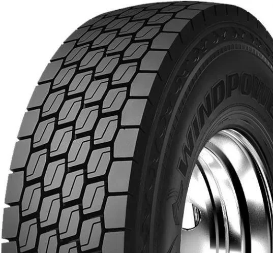 Close-up of a Falken Wildpeak M/T tire with a detailed tread pattern and a metallic rim.