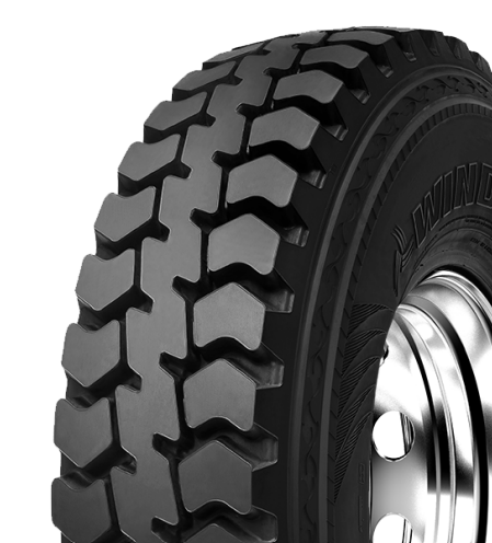 Windpower WDC57 Drive Tyre. Close-up of a black off-road vehicle tire with deep treads.