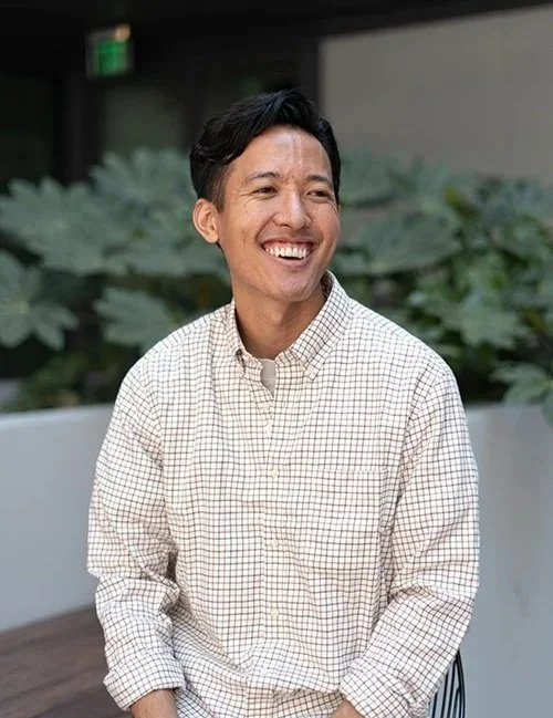 Joshua De La Cruz, male teen therapist in Fullerton laughing casually, showing approachable personality