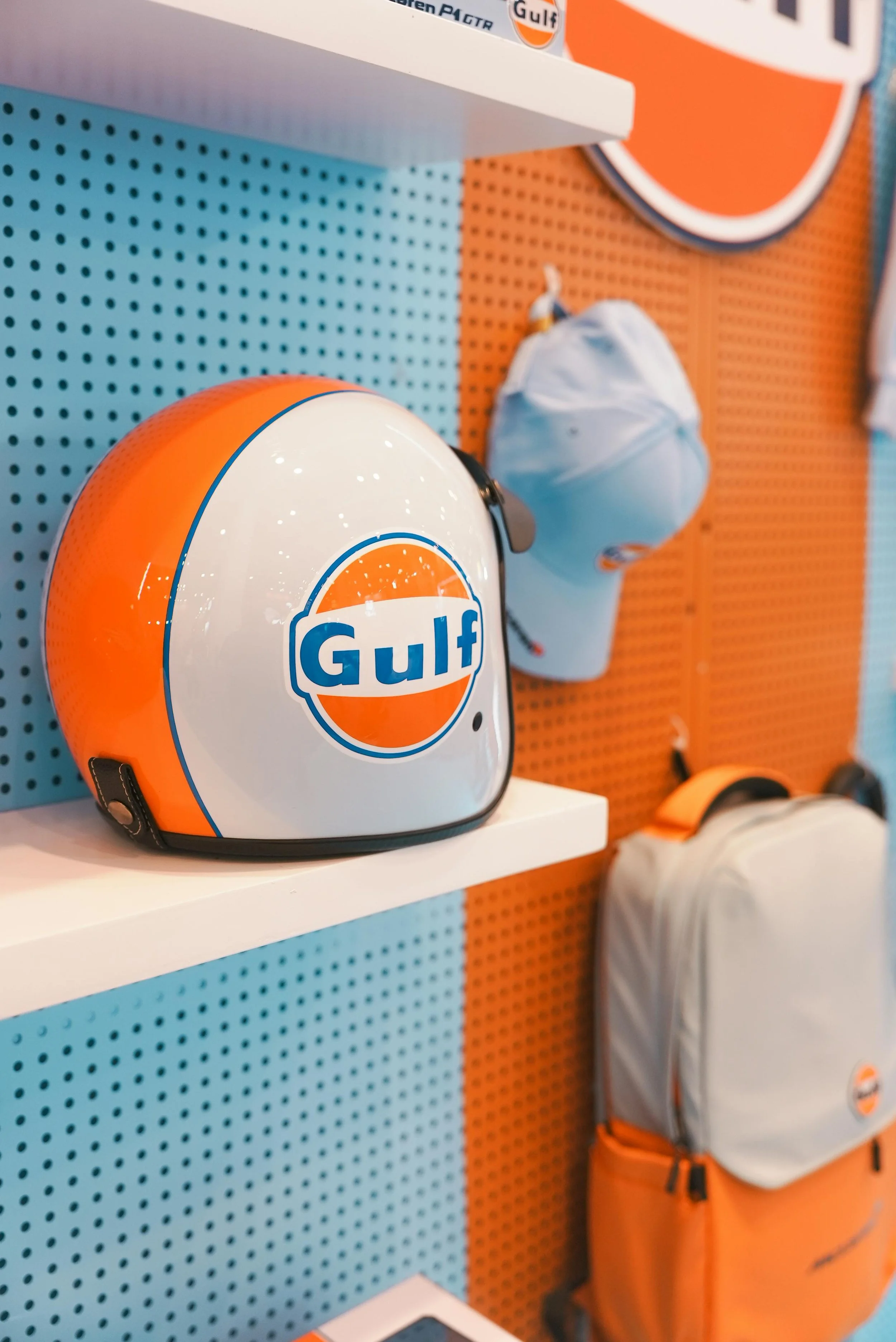 Blingz Promo branded merchandise display with Gulf helmet and apparel, example of culture-led promo marketing campaign
