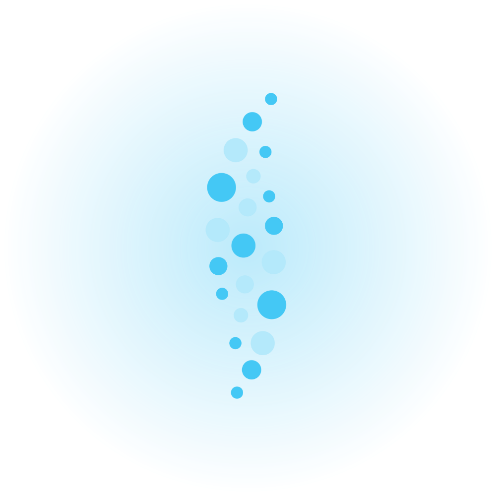 Blue bubbles rising in water, creating a pattern in a circular shape.