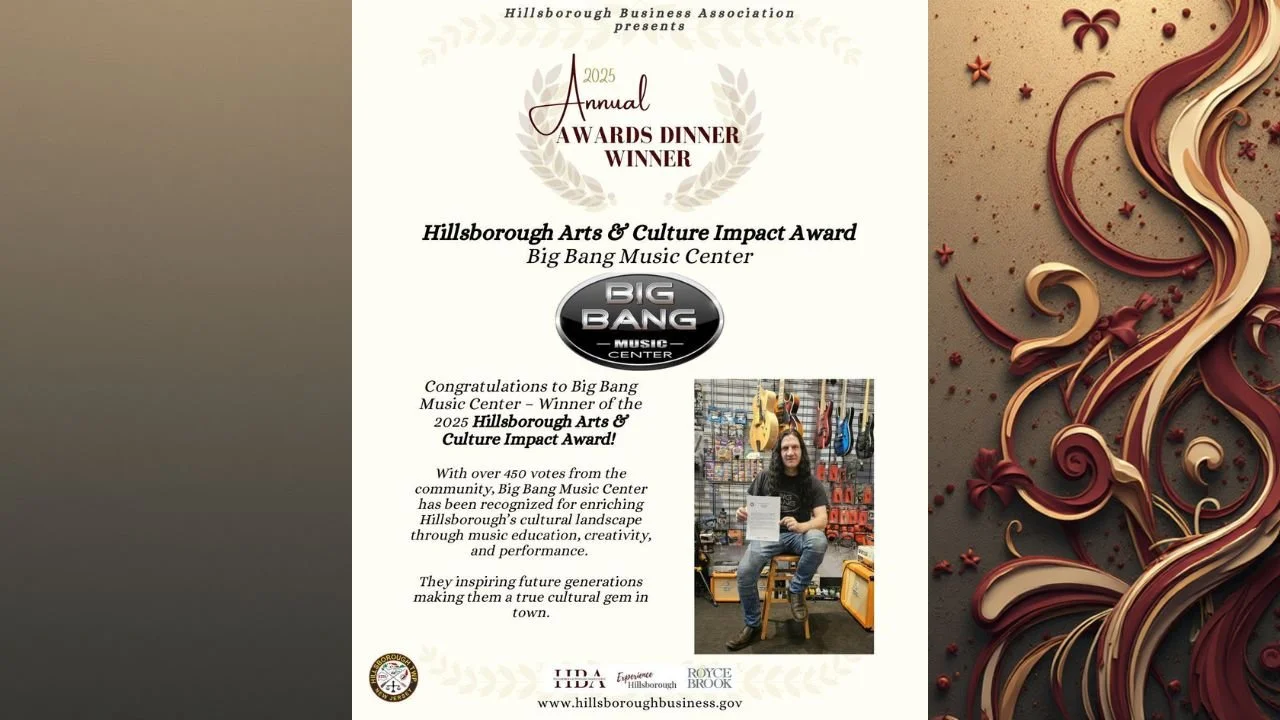 Certificate of award from Hillsborough Business Association recognizing Big Bang Music Center as the 2025 Arts & Culture Impact Award winner. The certificate includes the award title, recipient, a photo of a man with guitars, and decorative floral and swirl design elements.