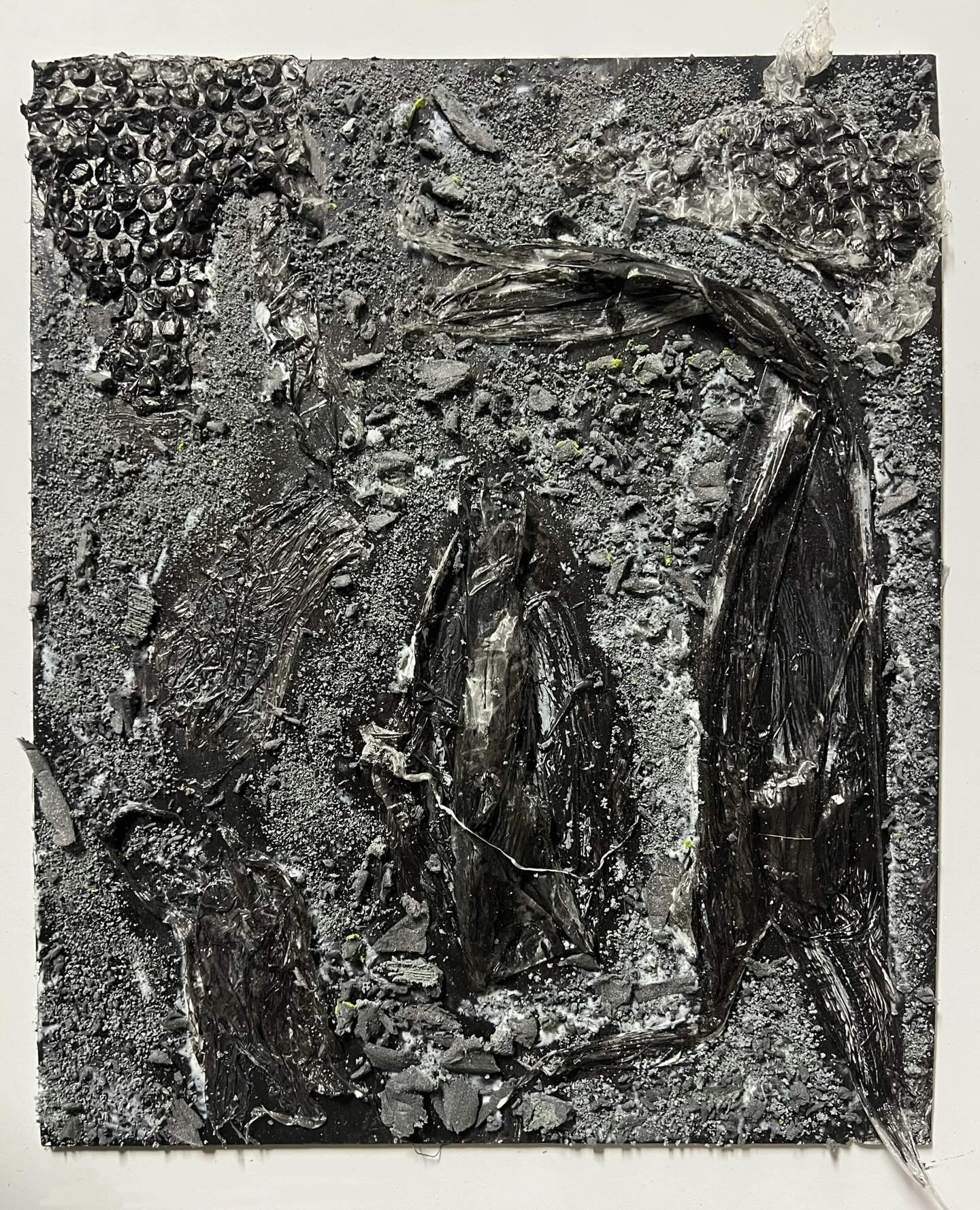 Compressed Matter, 2026
Material study using plastic wrap, PVA glue, bubble wrap, acrylic, and foam dust

Layering disposable materials until they become dense and tar-like, shifting from protective to suffocating. Thinking about the quiet violence o