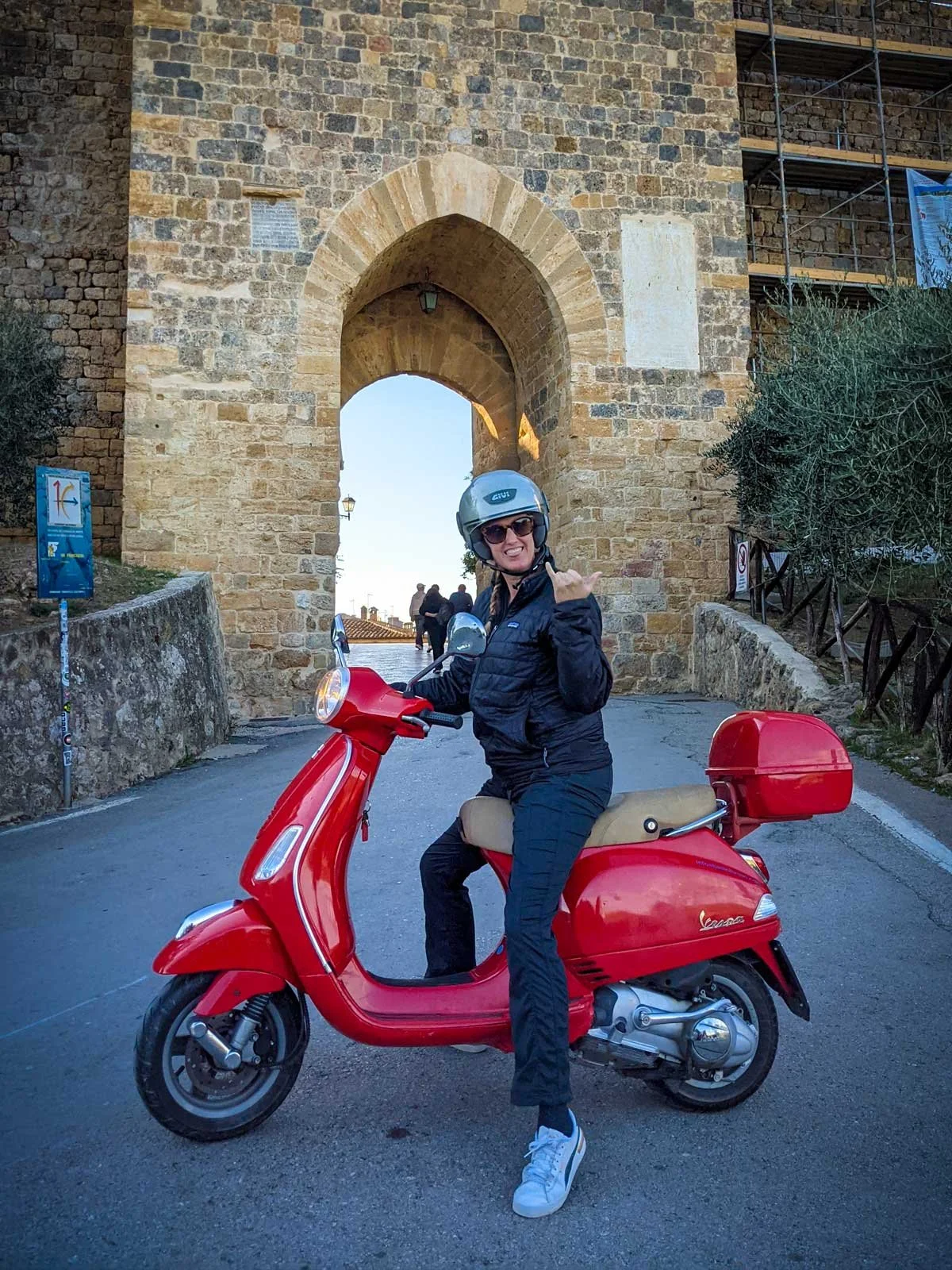 Riding a rented scooter in Italy