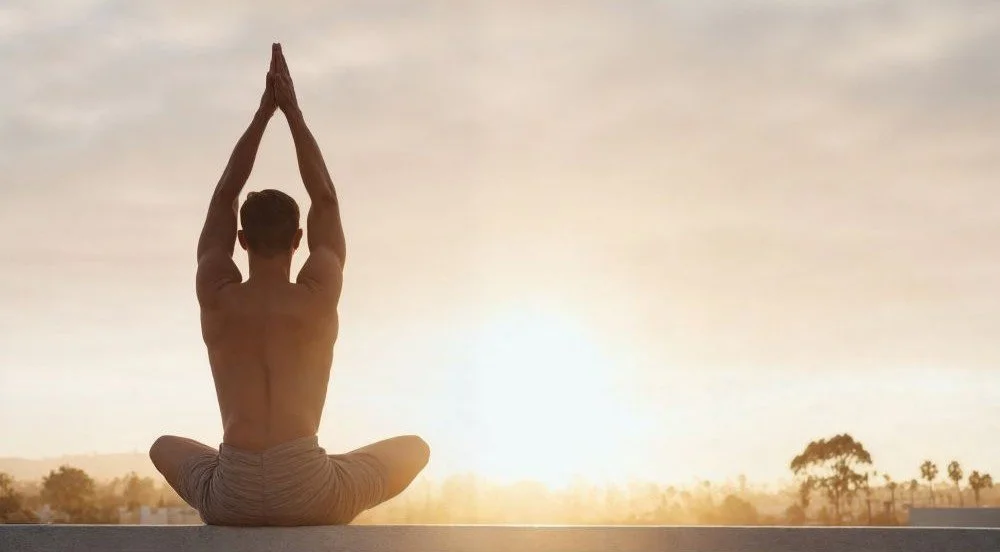 Image of a guy meditating