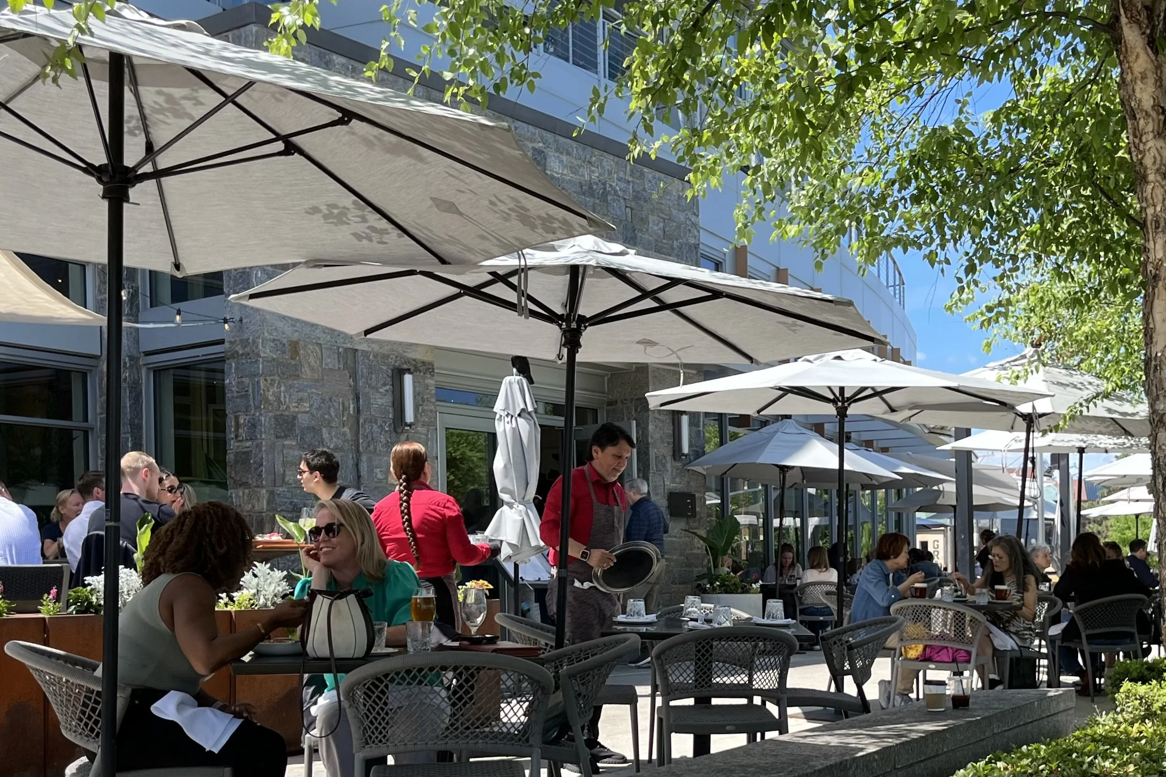 Dog-friendly outdoor dining tables at Ada’s on the River in Old Town Alexandria.