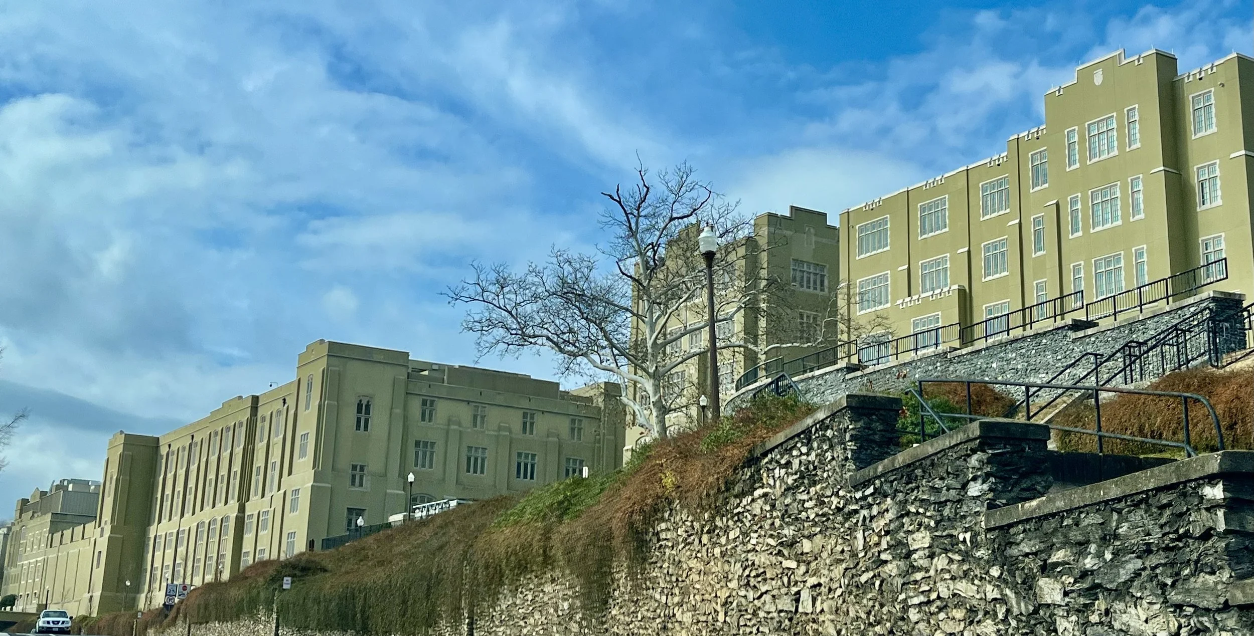 Historic stone buildings and green lawns at Virginia Military Institute (VMI) in Lexington, Virginia.