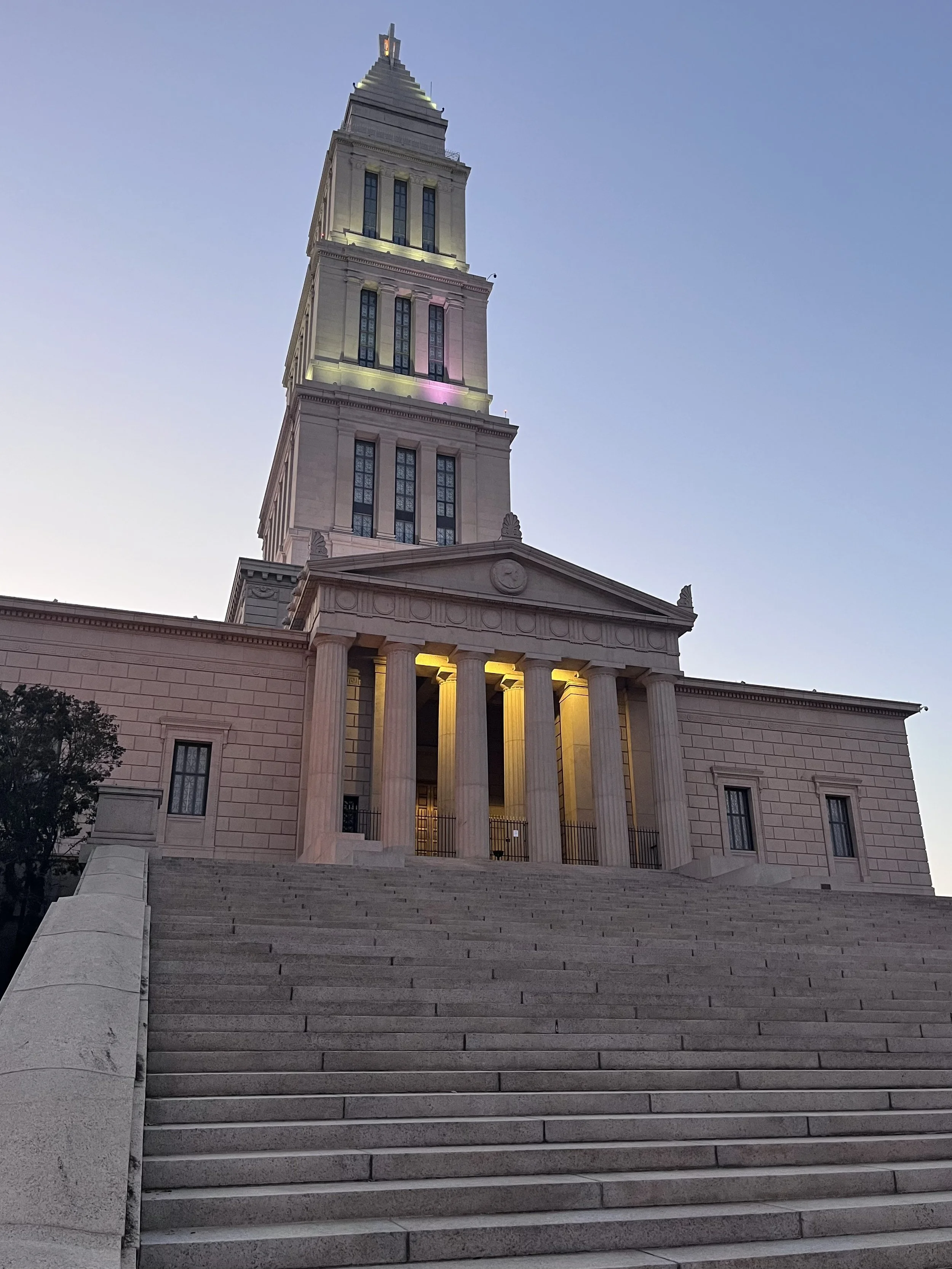 George Washington Masonic National Memorial glowing at dusk in Alexandria, Virginia.